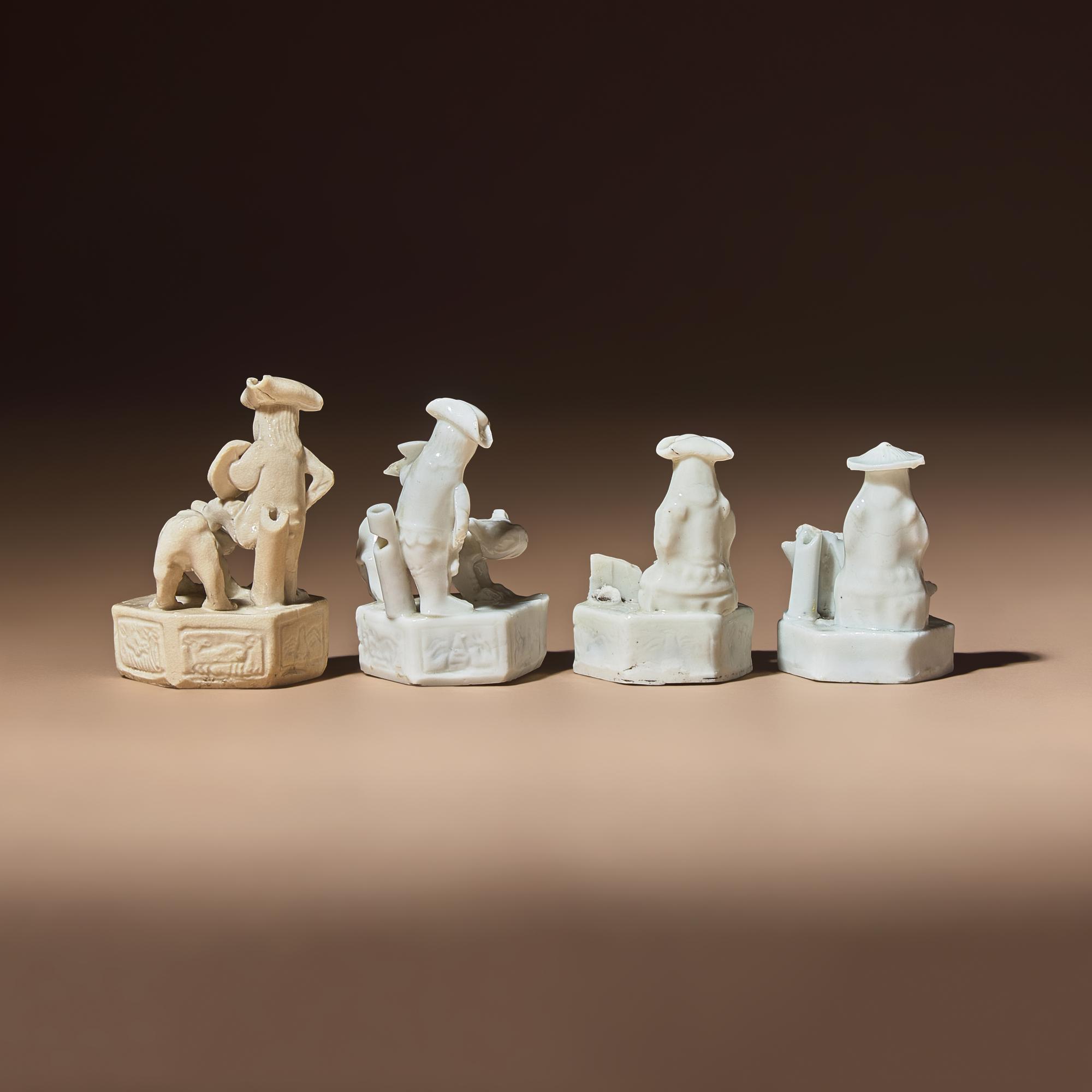 Four Miniature Chinese Blanc-de-Chine Porcelain 'European' Whistles, Late 17th-Early 18th Century — 清中期 德化白瓷西人鬥獸哨四件
