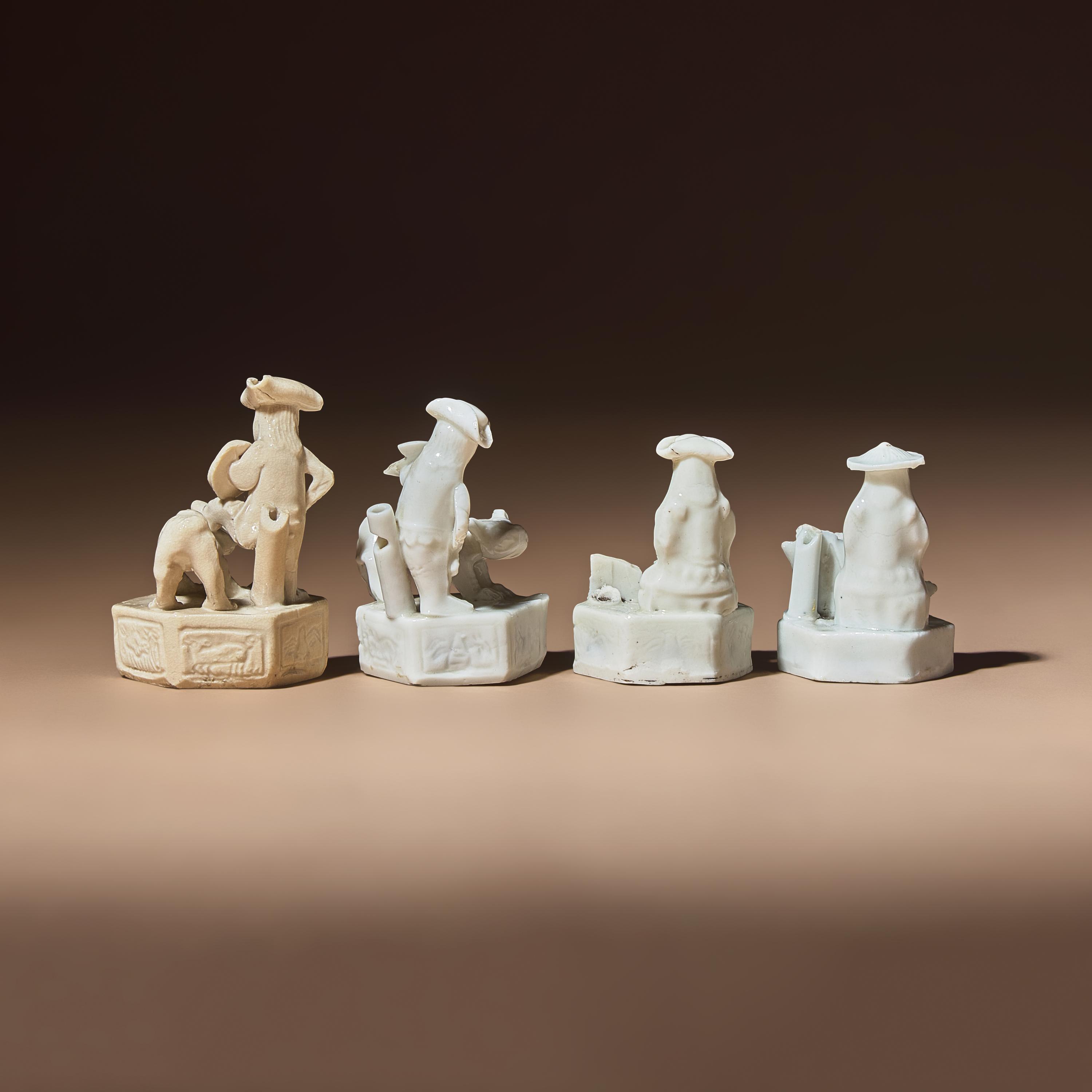 Four Miniature Chinese Blanc-de-Chine Porcelain 'European' Whistles, Late 17th-Early 18th Century — 清中期 德化白瓷西人鬥獸哨四件