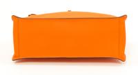 An Hermès Orange Togo Etribelt Handbag, 13.5" x 10.5" x 5"; Handle drop: 3.5".