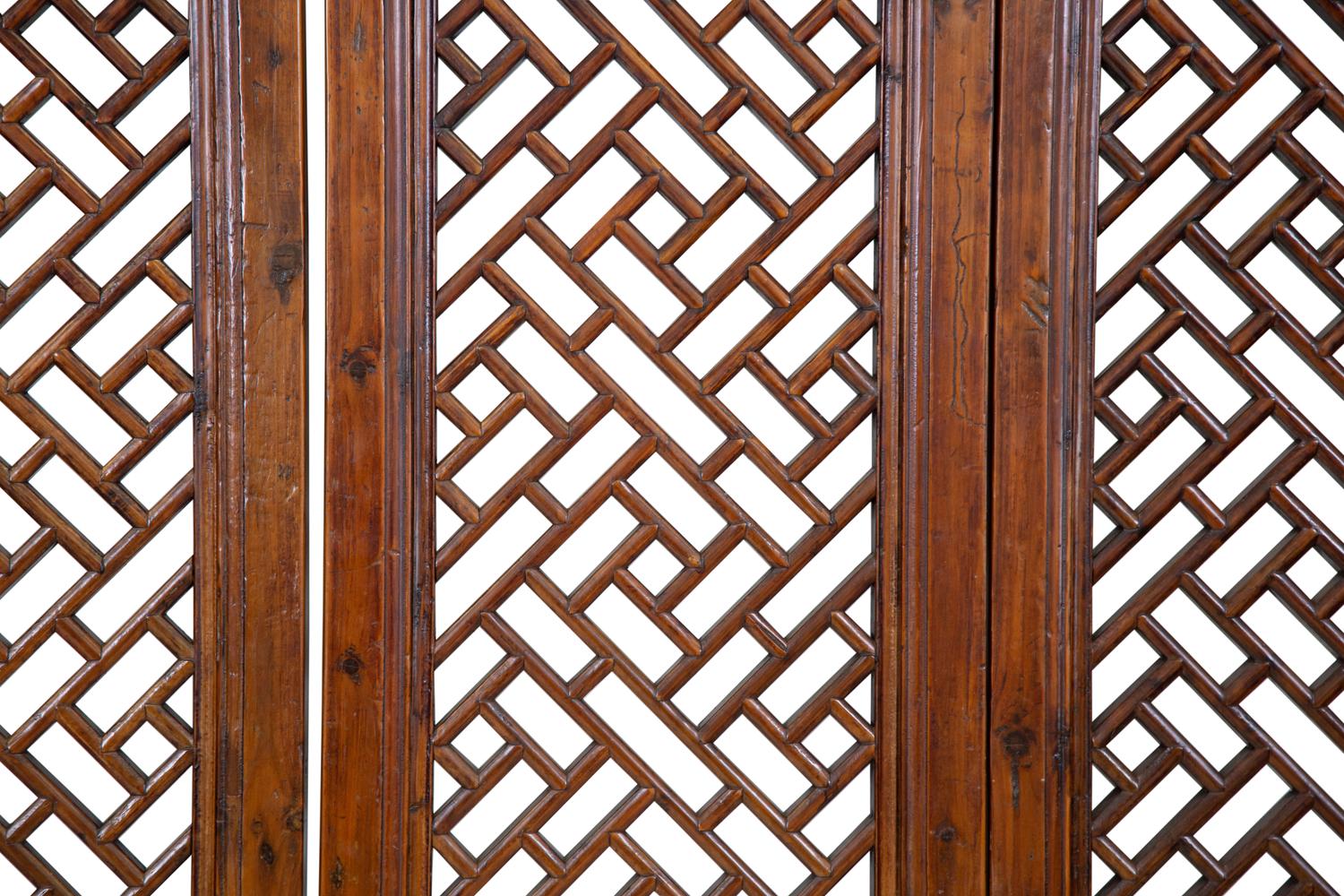 A Chinese Pierce Carved Hardwood Four Panel Screen
