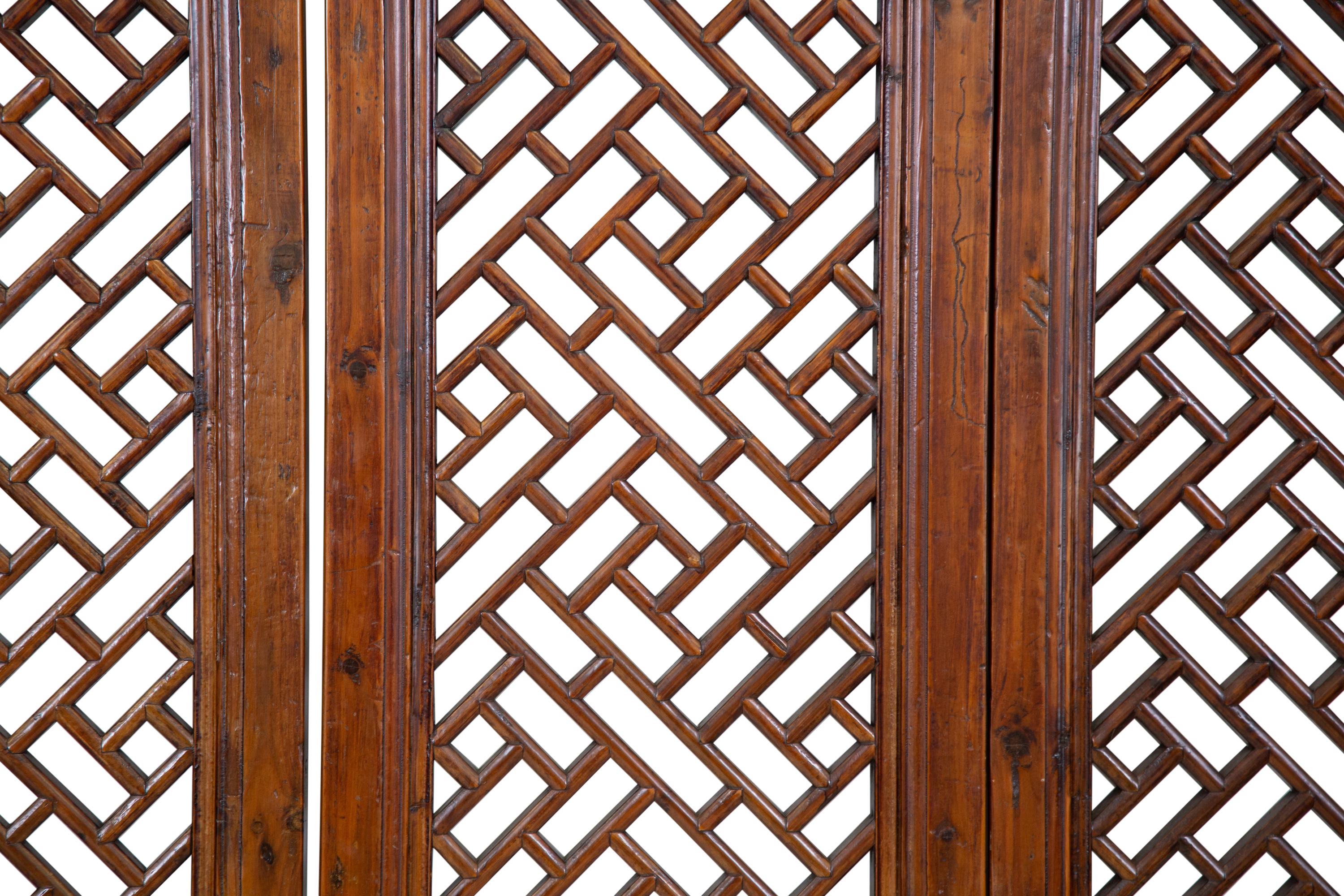 A Chinese Pierce Carved Hardwood Four Panel Screen