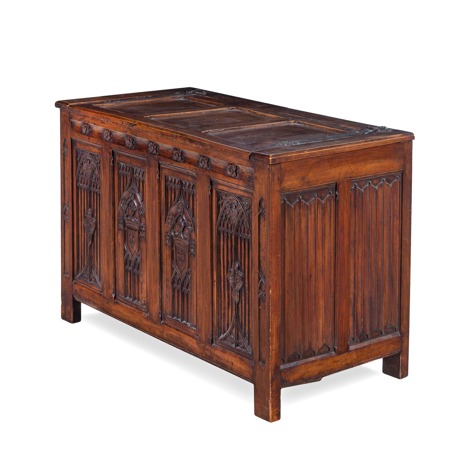 A Gothic Style Carved Walnut Chest