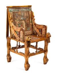 An Egyptian Style Parcel Gilt and Inlaid Throne Chair