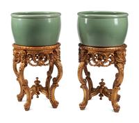 A Pair of Chinese Celadon Glazed Porcelain Fish Bowls on Giltwood Stands