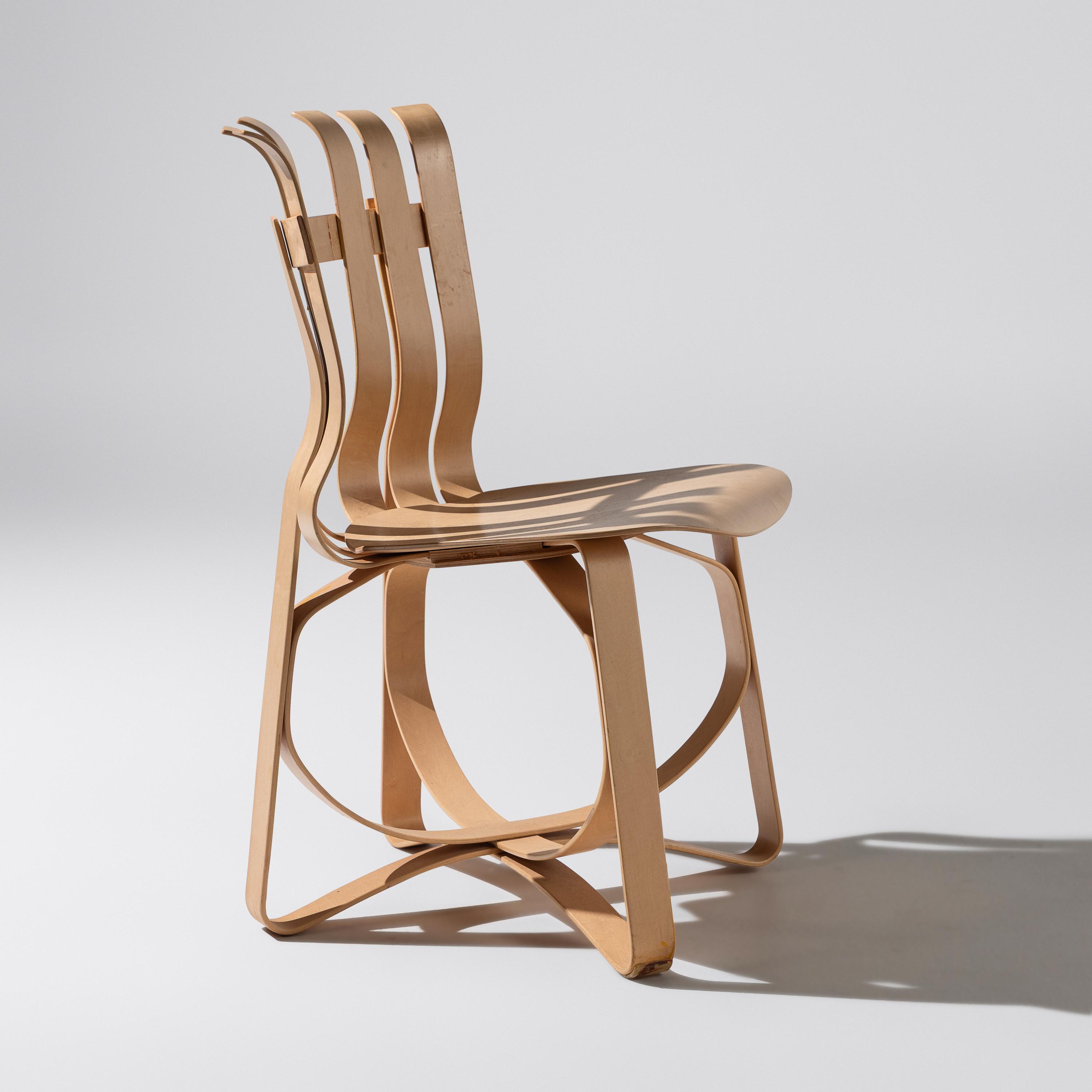 Frank Gehry (Canadian-American, 1929–2025) — Face Off table and Hat Trick Chairs, set of four KnollStudio Canada/USA, 1990 / 1993