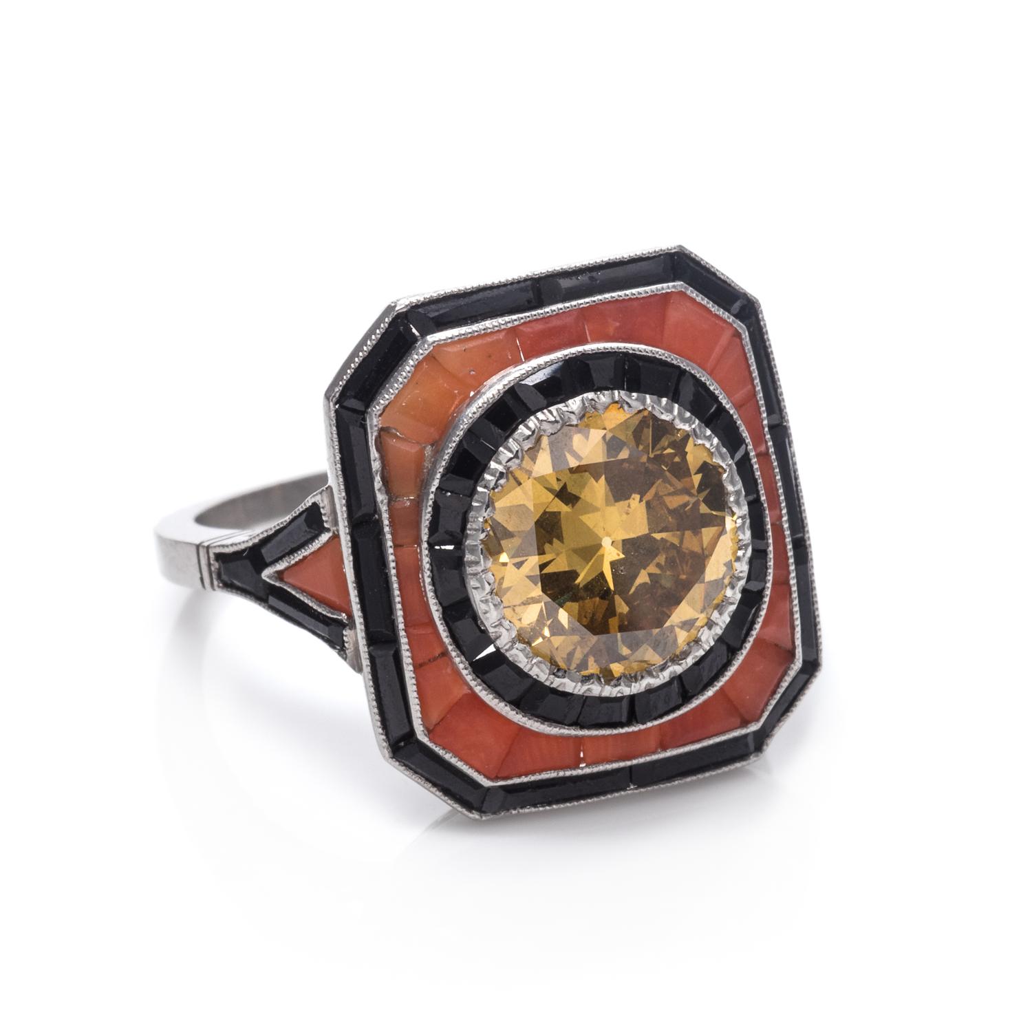A Platinum, Fancy Colored Diamond, Coral and Onyx Ring,