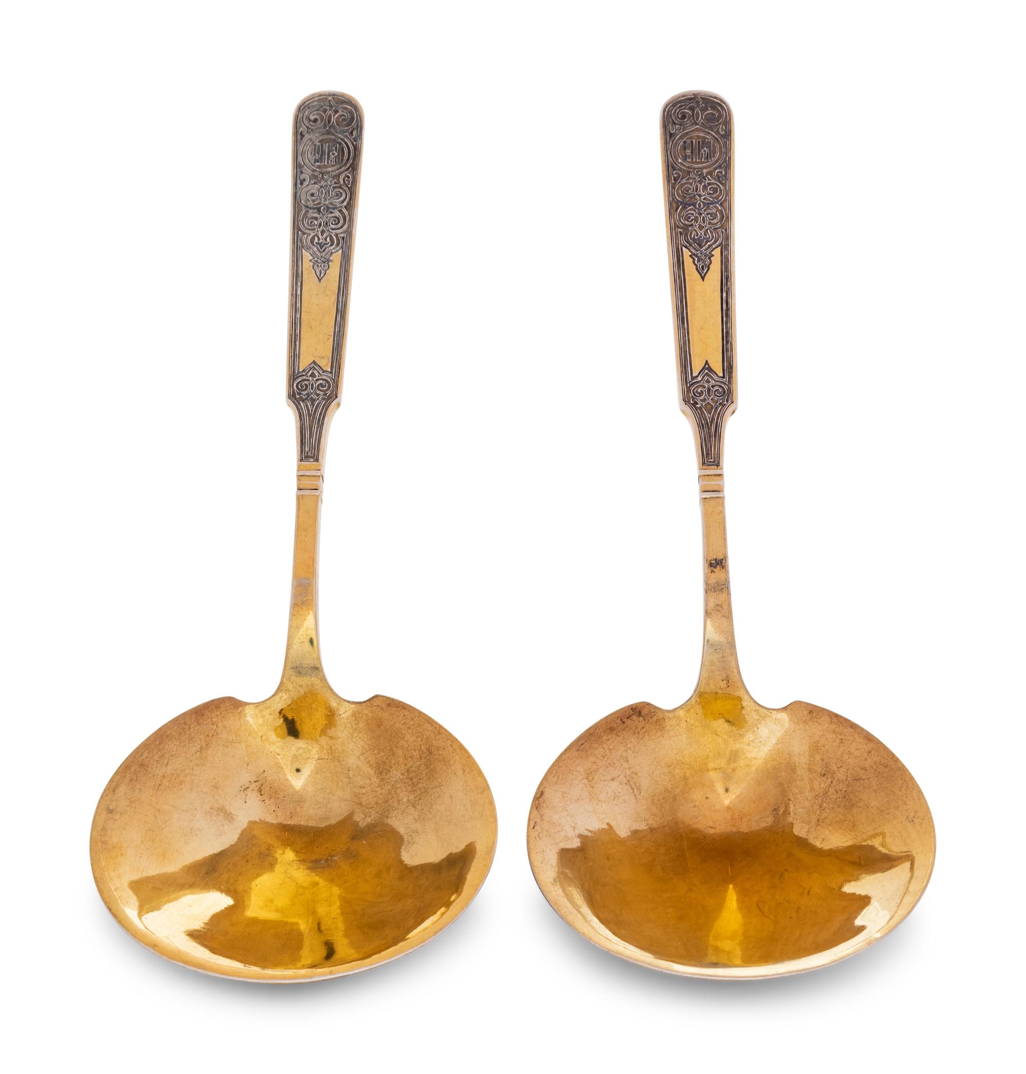 A Pair of Russian Niello Silver-Gilt Serving Spoons