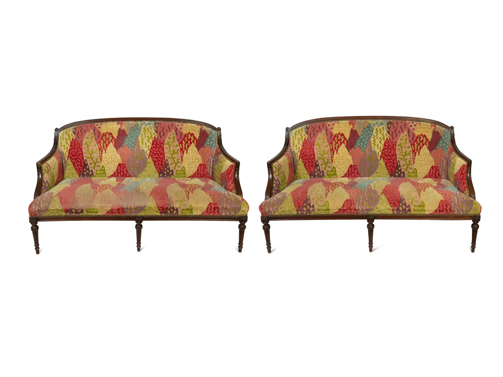 A Pair of Louis XVI Style Mahogany Settees