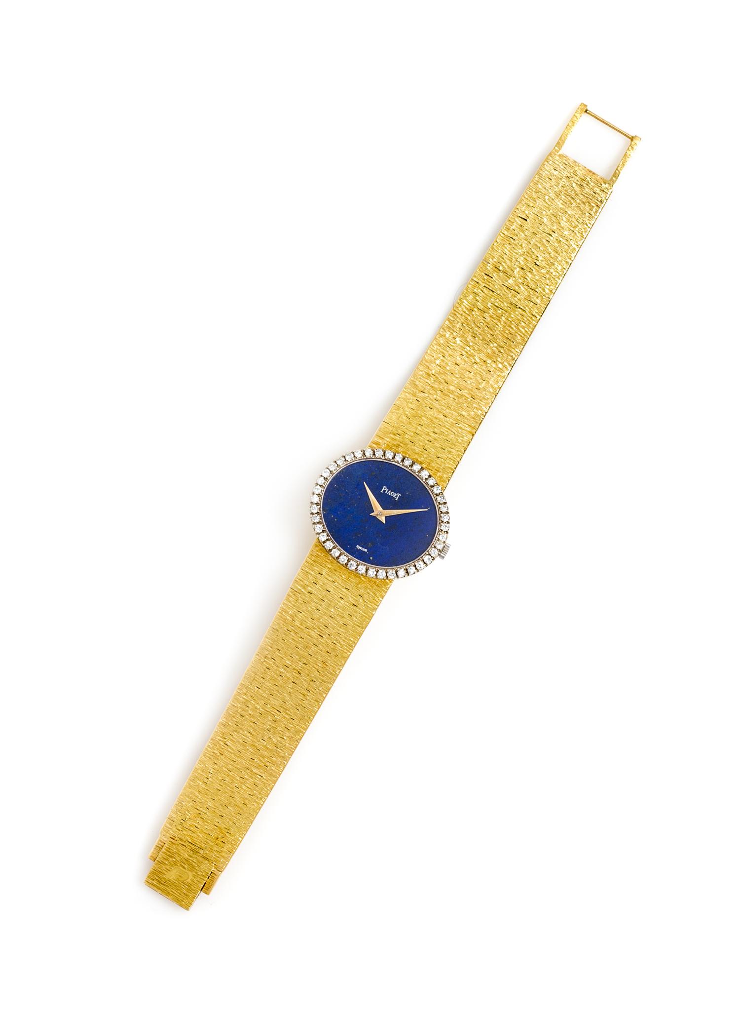 An 18 Karat Yellow Gold, Diamond and Lapis Wristwatch, Piaget, 40.20 dwts.
