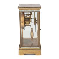 A Japy Freres Gilt Bronze and Champleve Clock