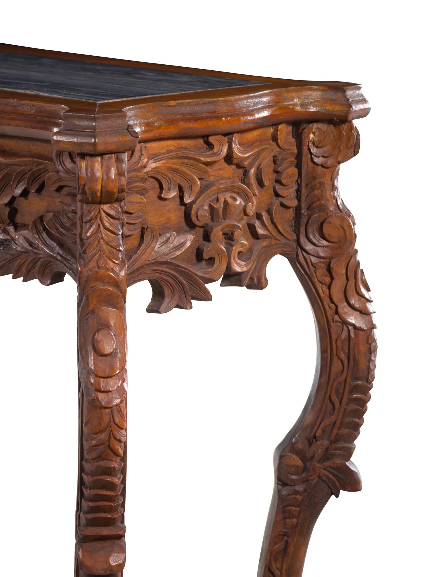 An Italian Carved Walnut Marble-Top Console Table