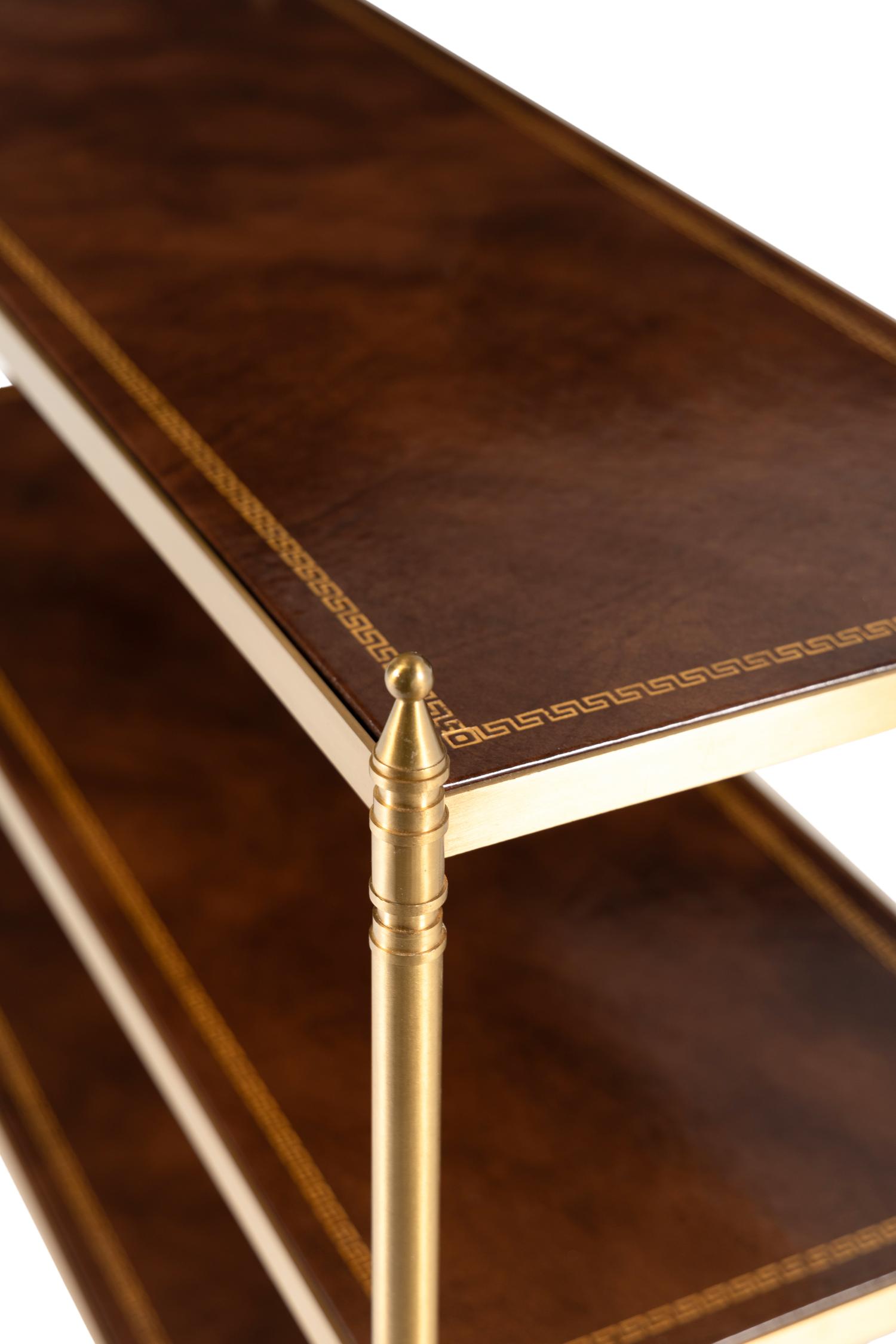 A Brass and Leather Three-Tier Side Table