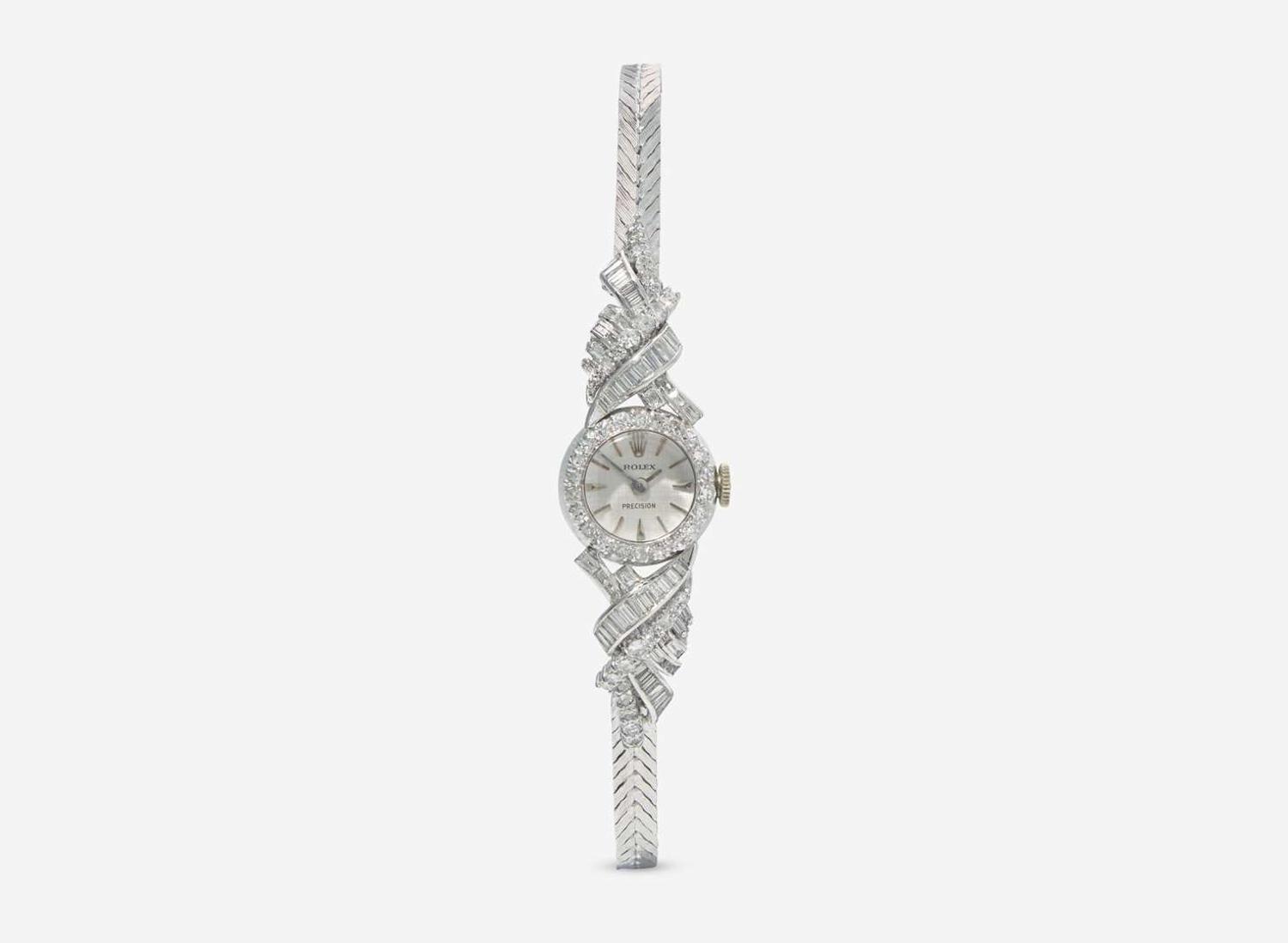 A Ladies 14K White Gold and Diamond Rolex Watch