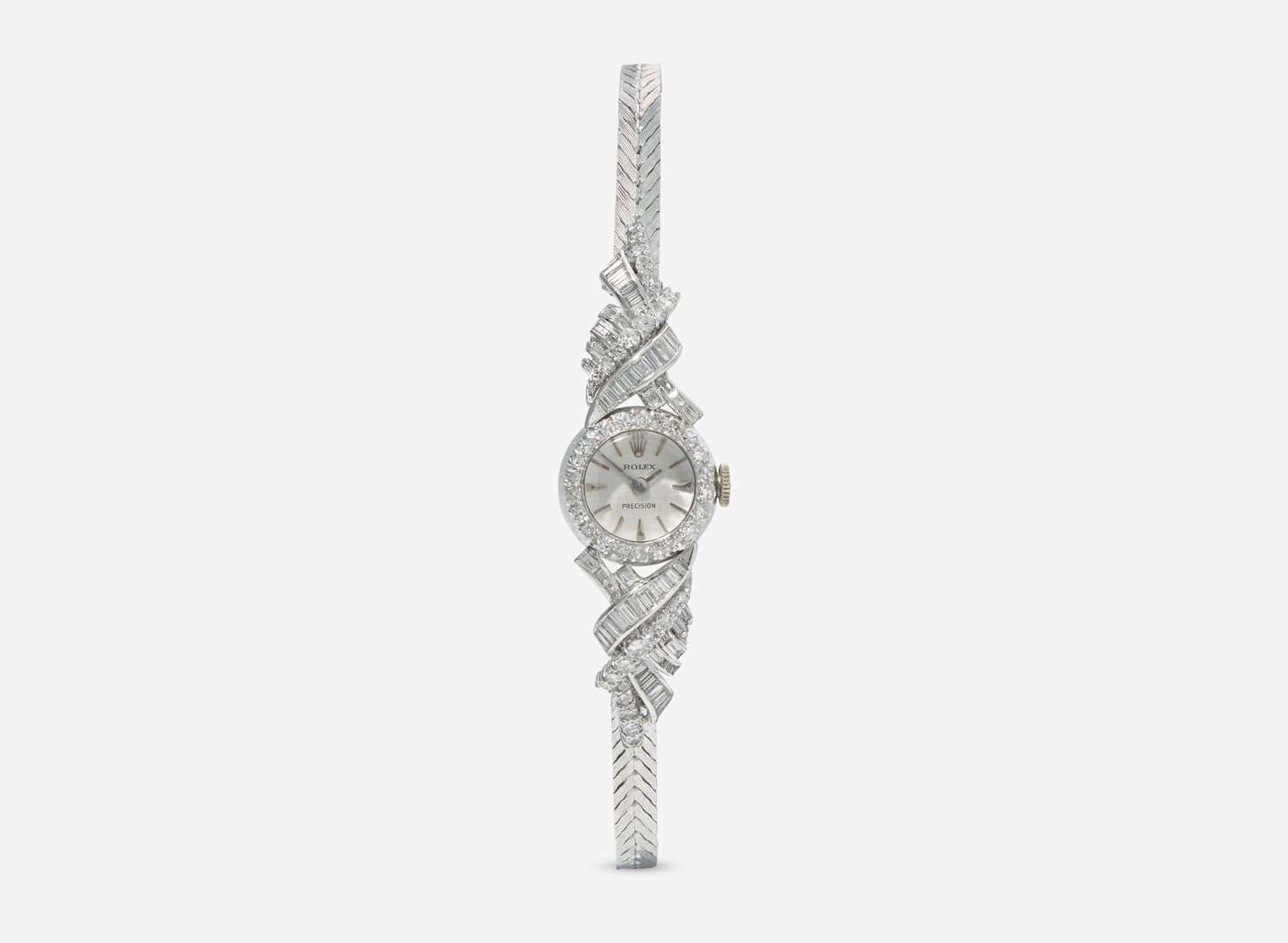 A Ladies 14K White Gold and Diamond Rolex Watch