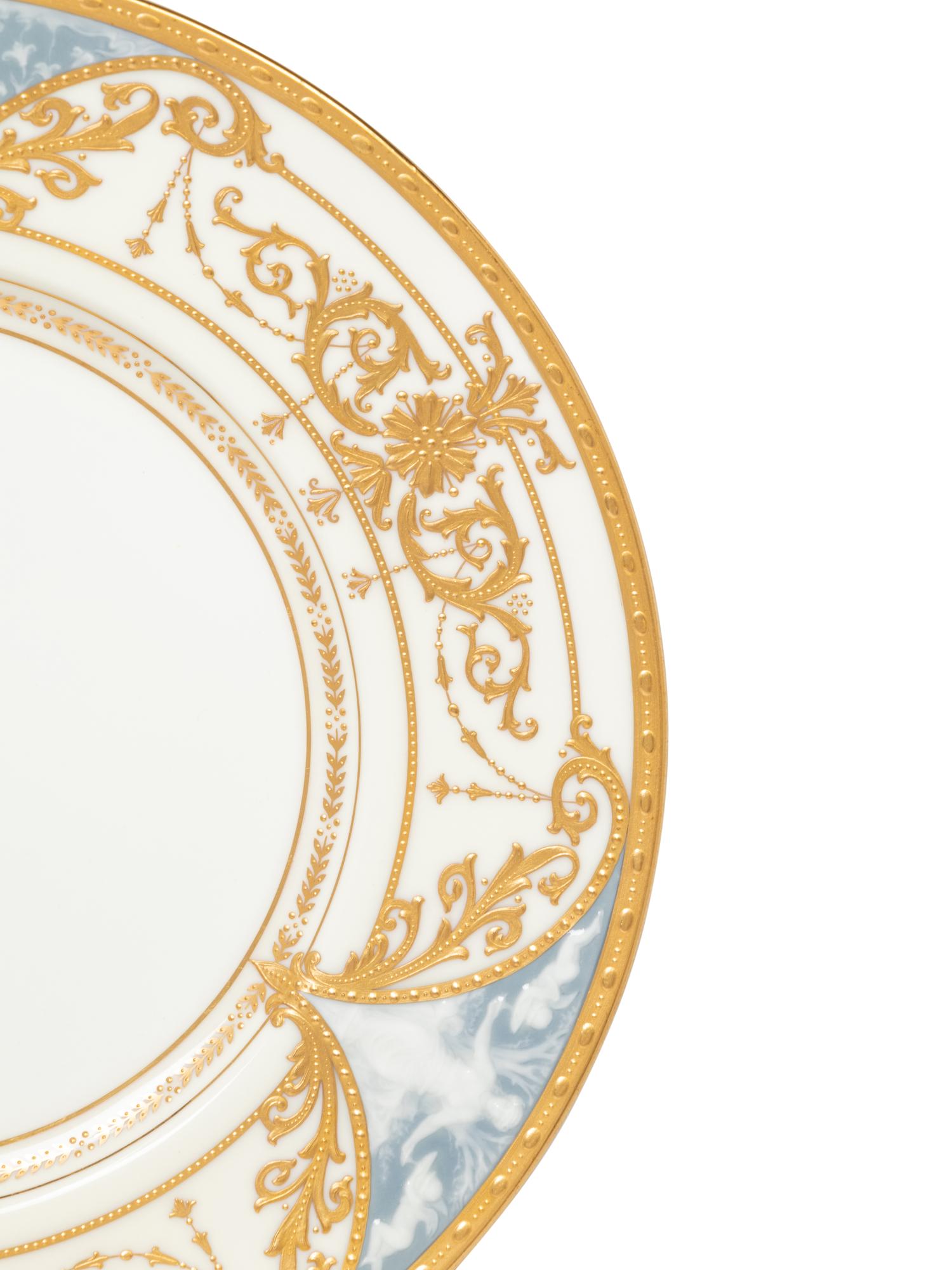A Set of Twelve Mintons Pâte-sur-Pâte Parcel-Gilt Porcelain Plates