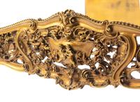 An Italian Rococo Style Giltwood Bed