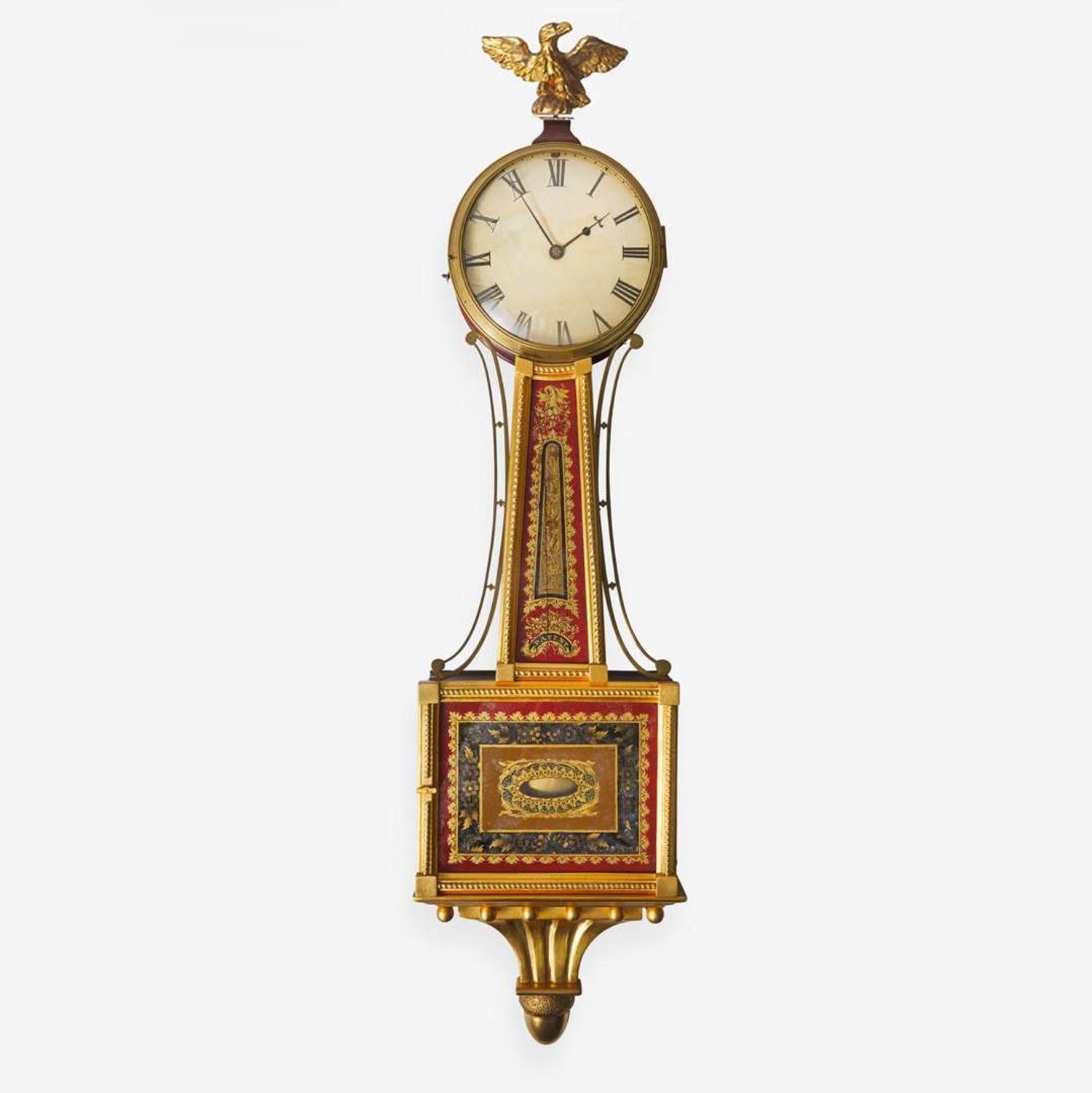 A Federal giltwood and églomisé banjo clock early 19th century