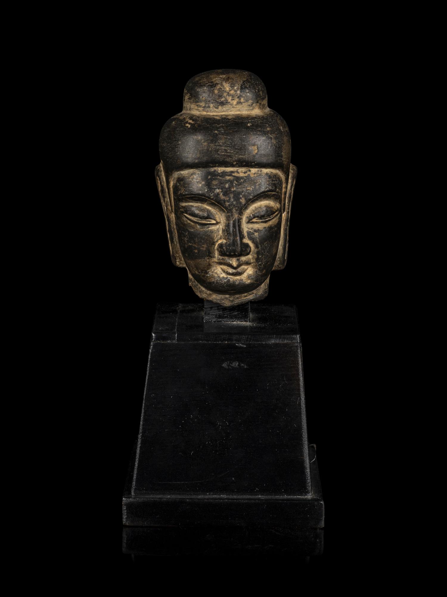 A Chinese Stone Carving of Buddha Head