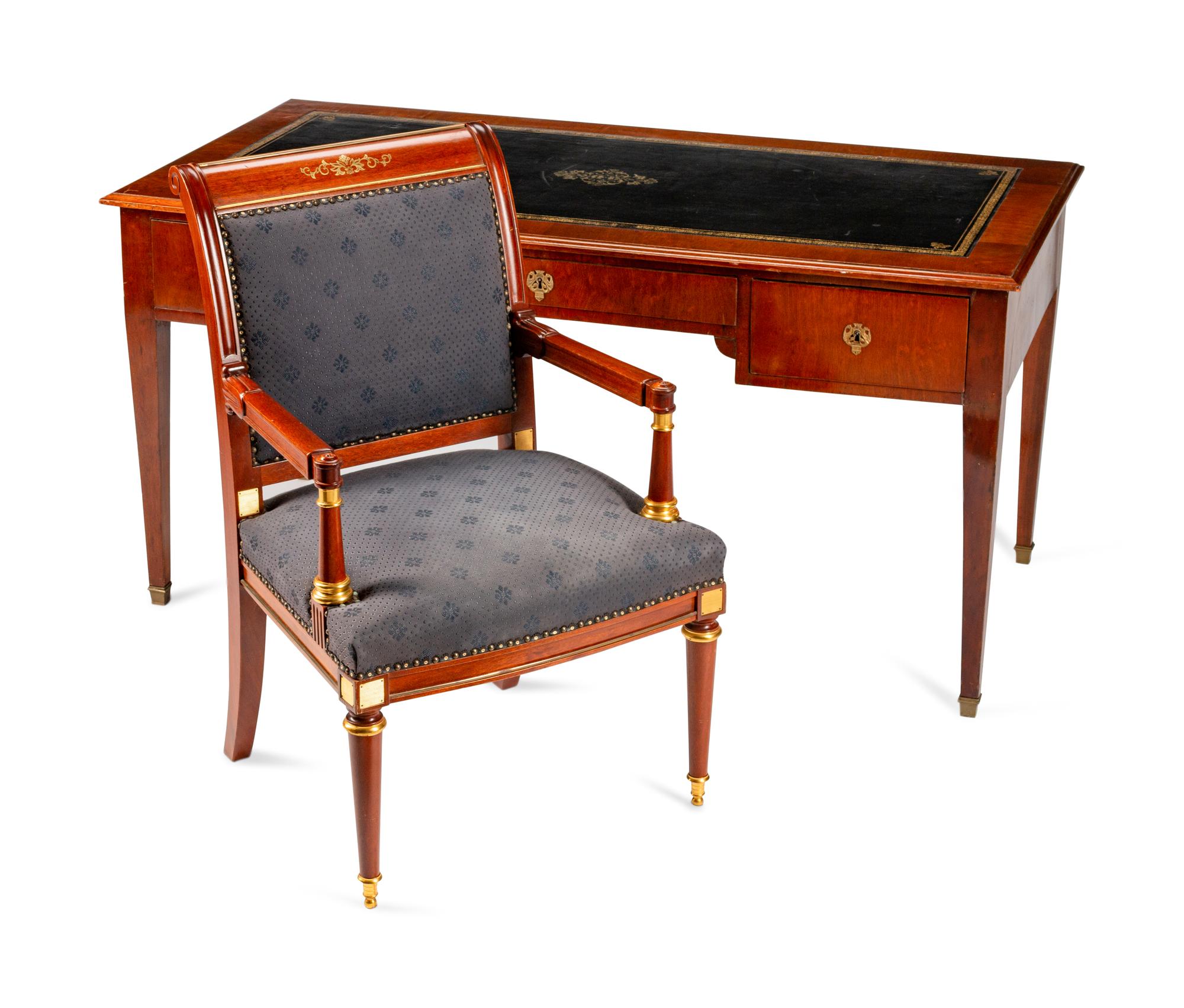 A Baltic Neoclassical Style Mahogany Desk and Chair