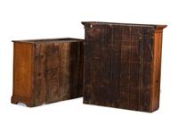 A Folk Art Carved and Paneled Pine Step-Back Cupboard