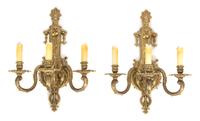 A Pair of Louis XV Style Gilt Bronze Three-Light Wall Sconces Height 18 x width 14 x depth 10 inches. — 20TH CENTURY