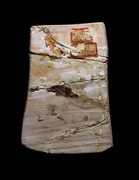 An Egyptian Painted Limestone Relief Fragment