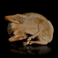 A Japanese Studio Ceramic Figure of a Recumbent Deer, Meiji/Taisho Period
