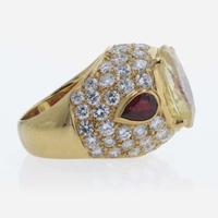 An 18K Yellow Gold and Gemstone Ring