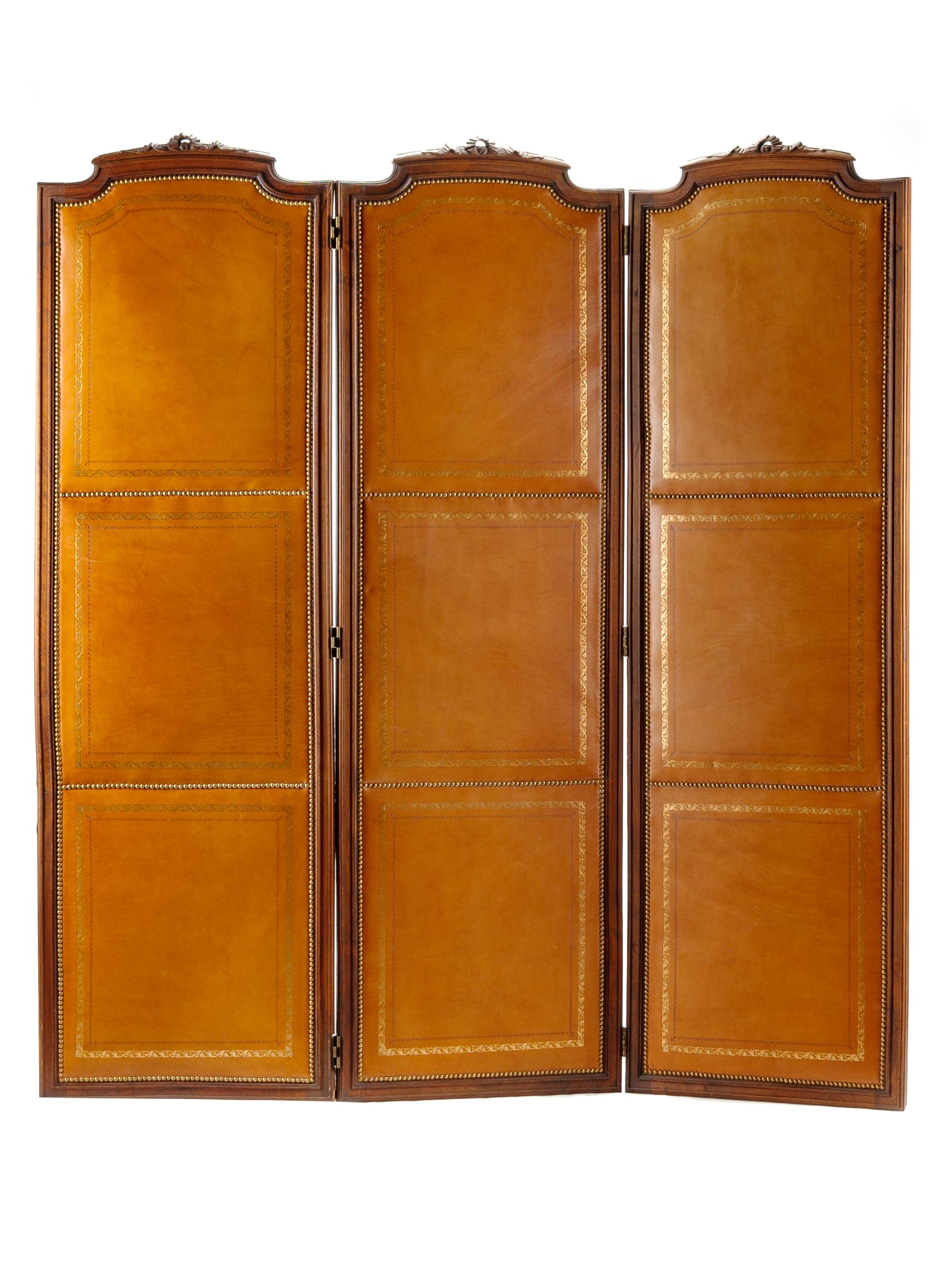 An English Mahogany and Tooled Leather Three-Panel Floor Screen