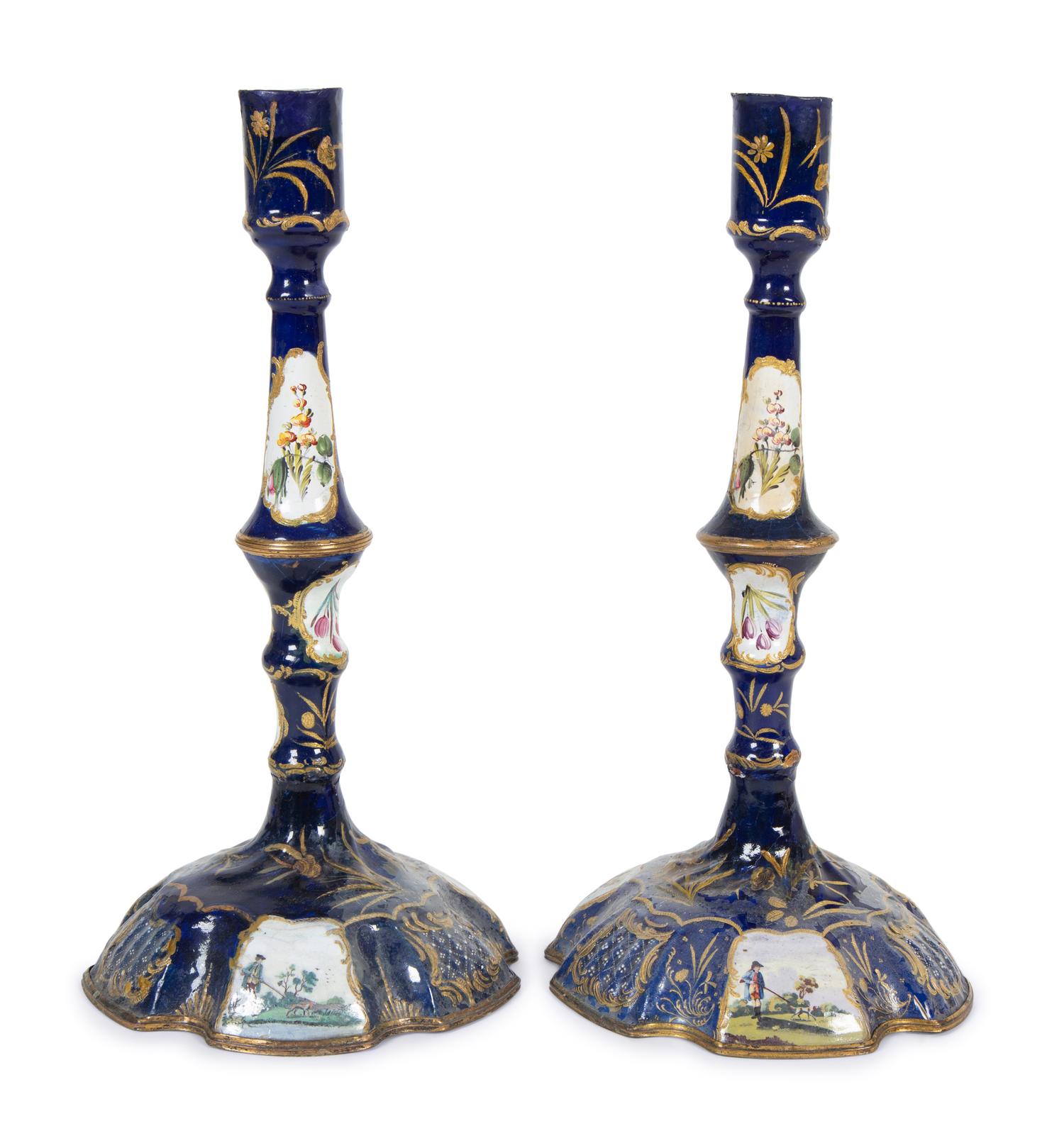 A Pair of Battersea Enamel Candlesticks