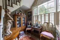 A Pair of Italian Painted Faux Marble and Parcel-Gilt Corner Cabinets