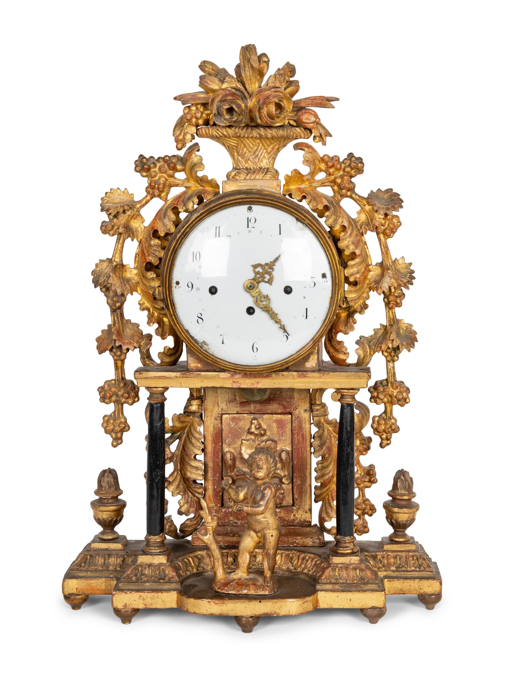 An Austrian Carved Giltwood Mantel Clock