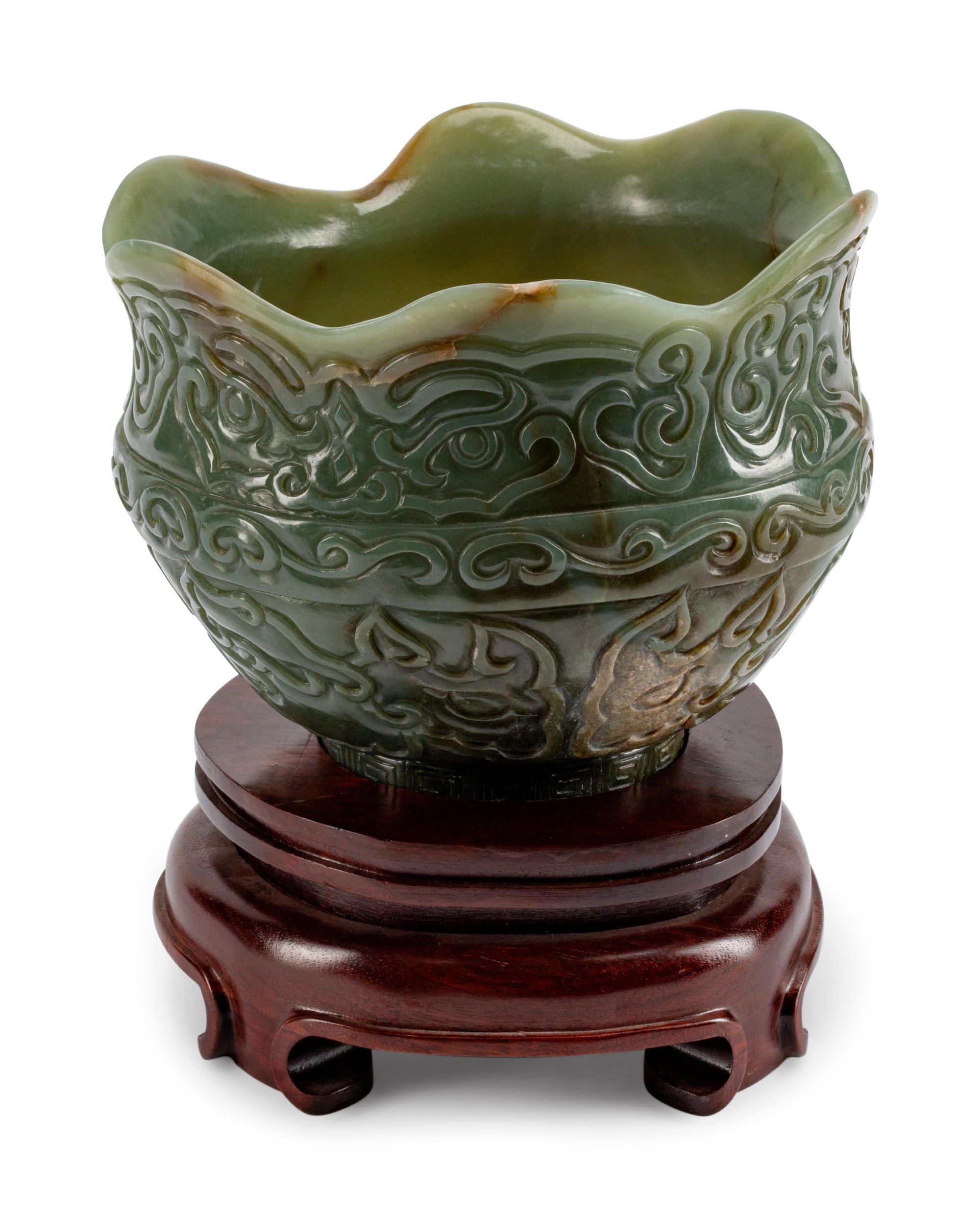 A Chinese Carved Jadeite Bowl
