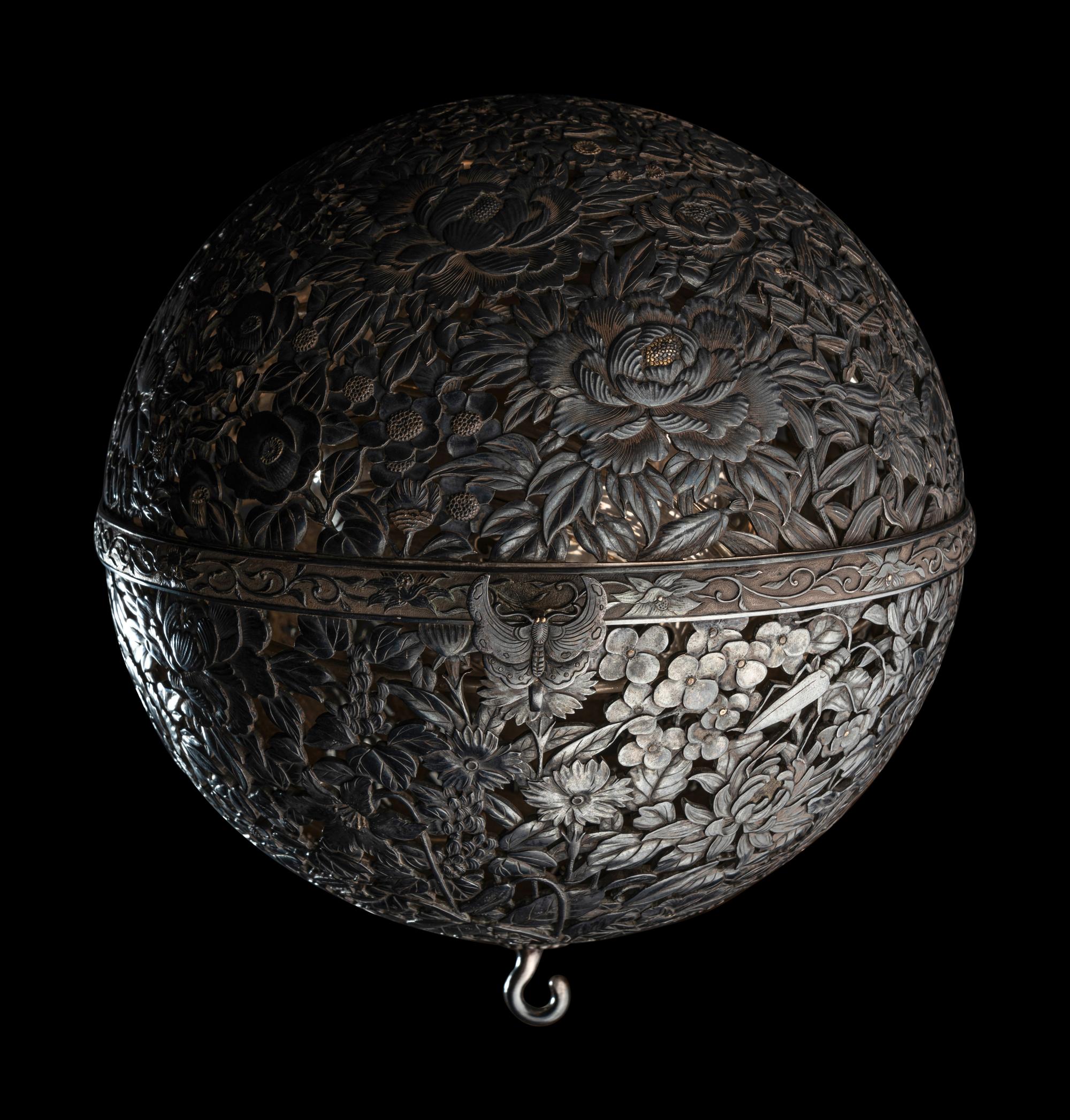 A Japanese Silver and Parcel Gilt Hanging Incense Ball