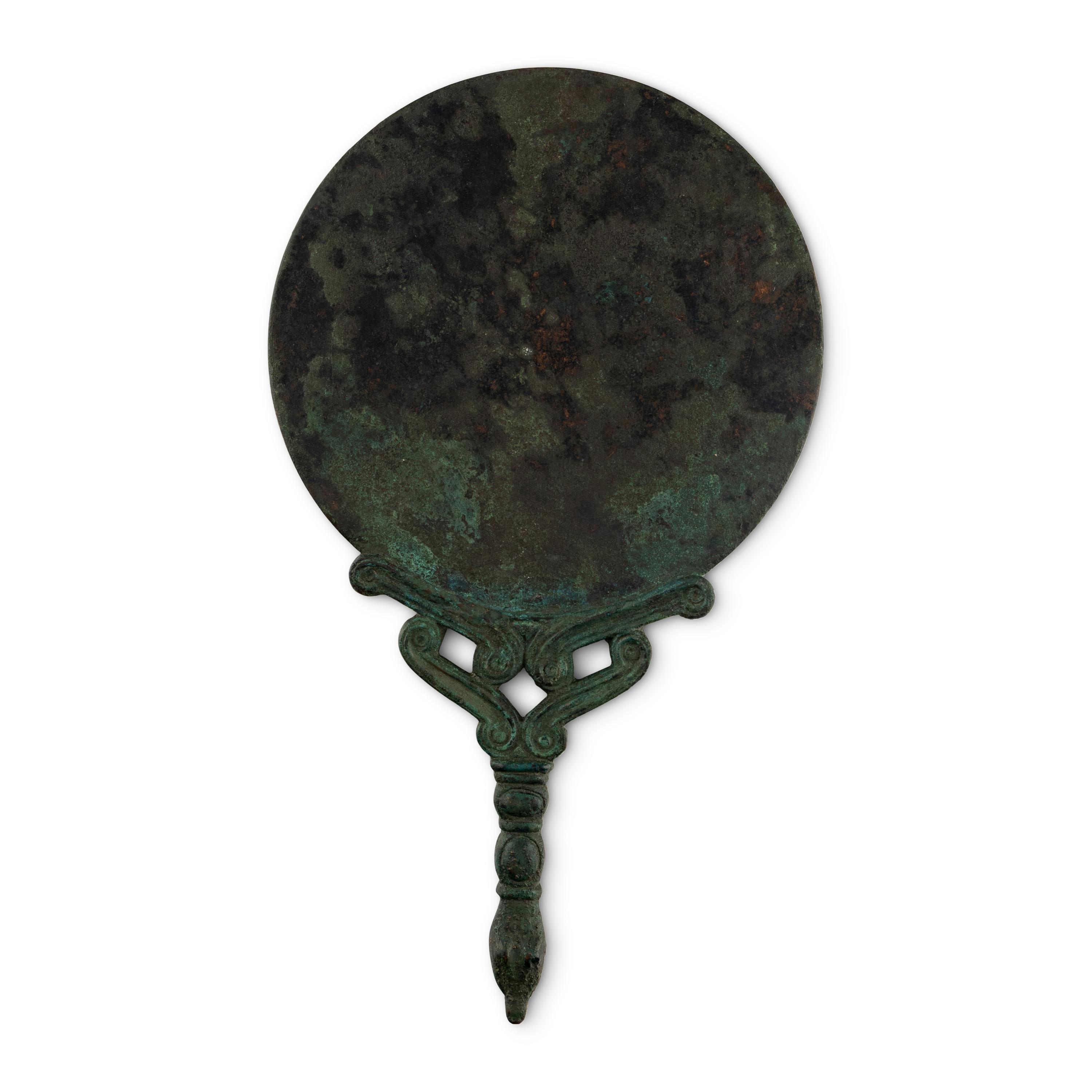 An Etruscan Style Bronze Mirror with Crocodile Handle