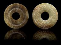 Two Jade Bis Diameter of first 2 3/8 inches.