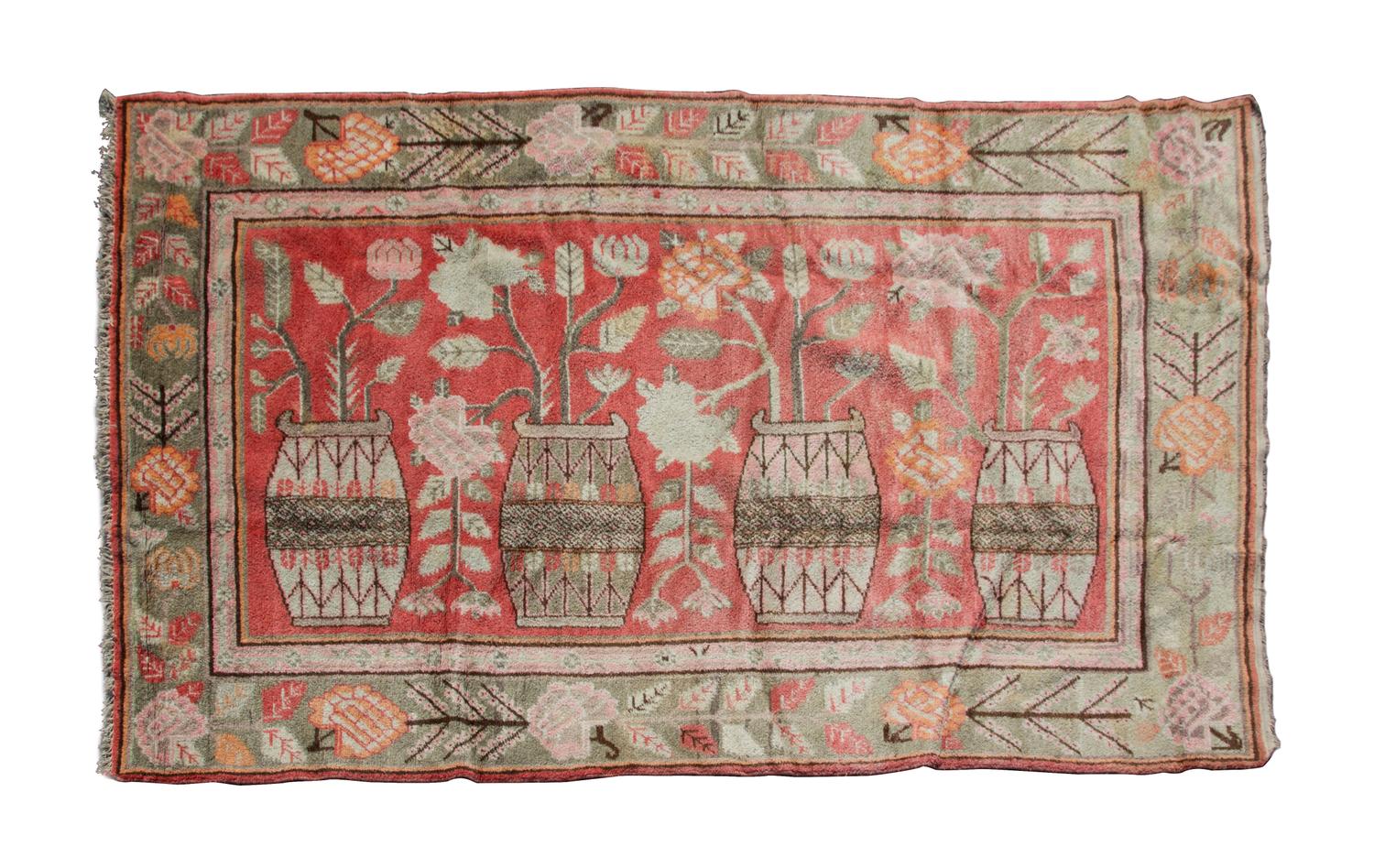 A Persian Wool Rug 8 feet 10 1/2 inches x 5 feet.