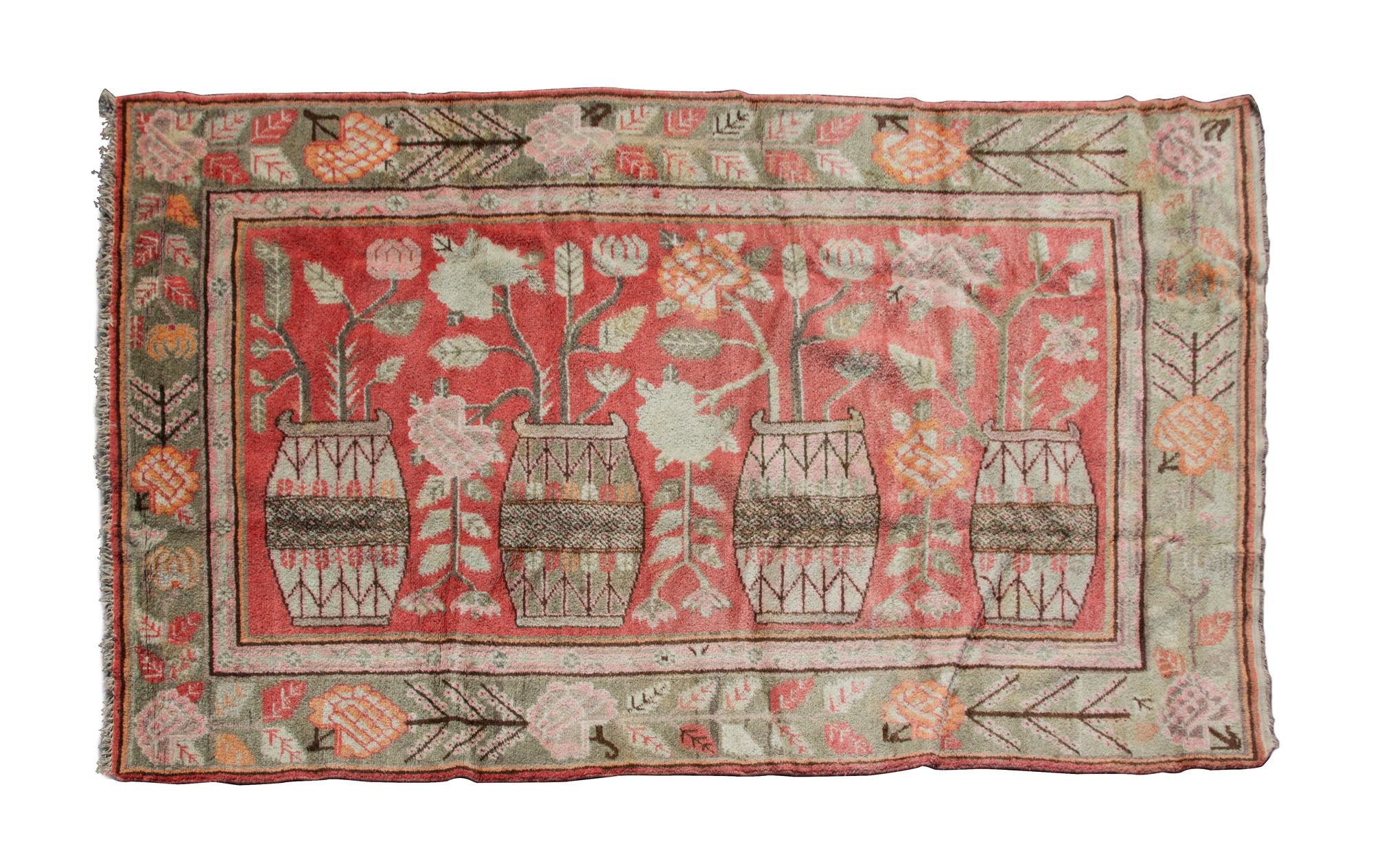 A Persian Wool Rug 8 feet 10 1/2 inches x 5 feet.