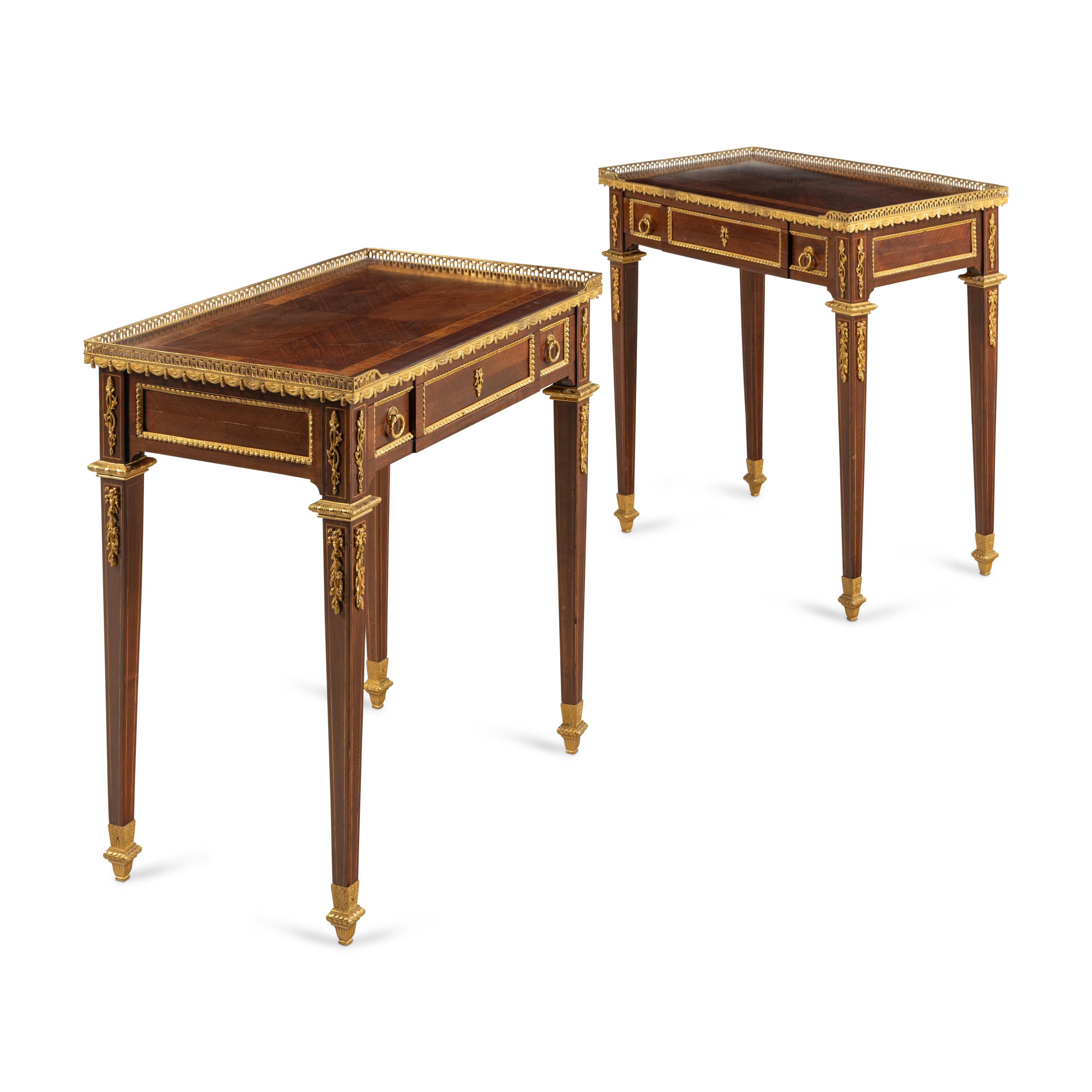 A Pair of Louis XVI Style Mahogany and Gilt Bronze Mounted Side Tables