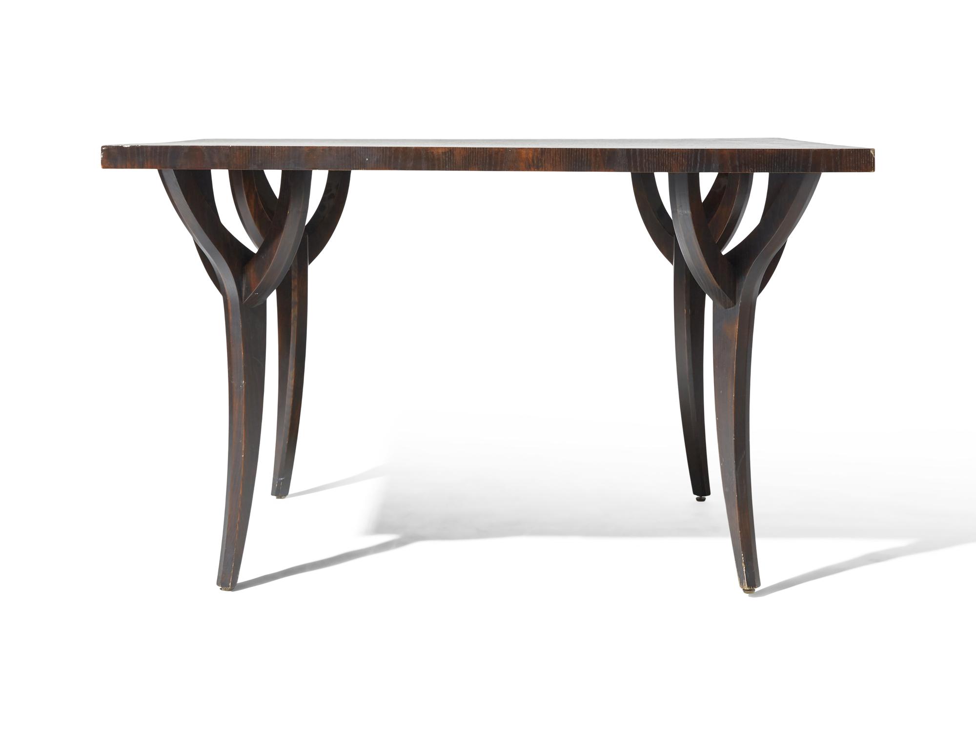 An Ebonized and Veneered Ash Dining Table Designed by Juan Montoya DONATED BY JUAN MONTOYA DESIGN
