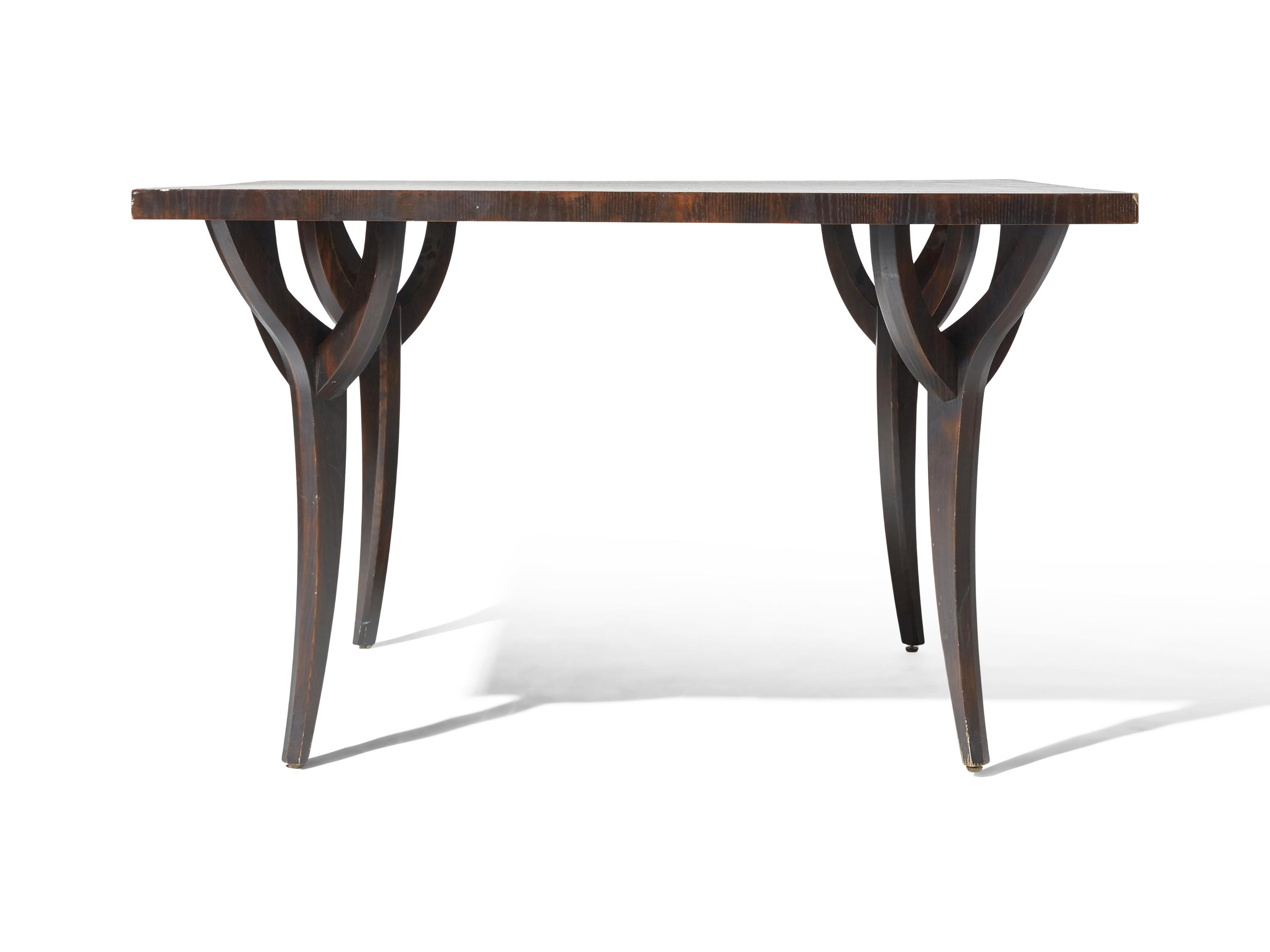 An Ebonized and Veneered Ash Dining Table Designed by Juan Montoya DONATED BY JUAN MONTOYA DESIGN
