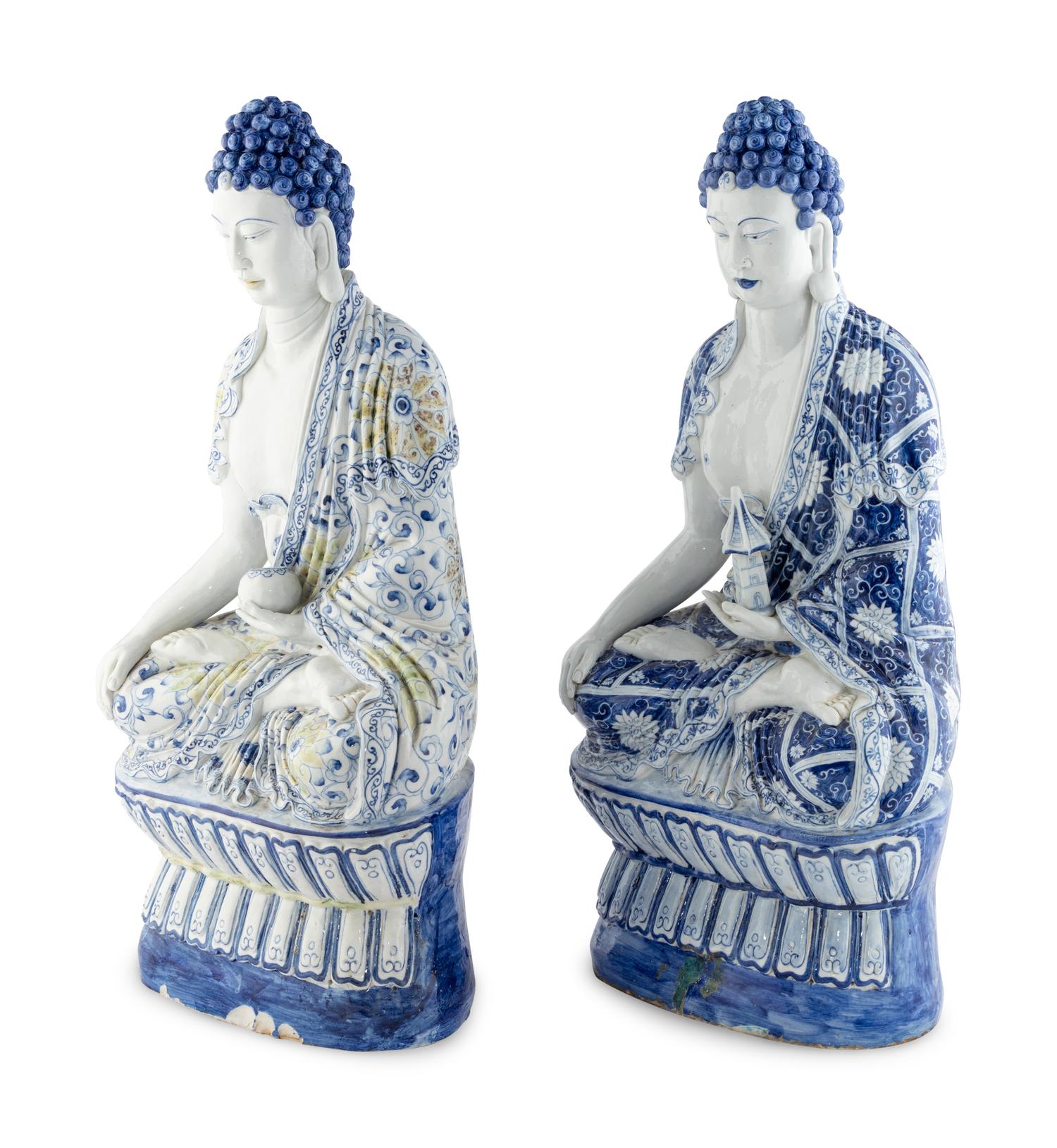 Two Blue and White Glazed Seated Figures