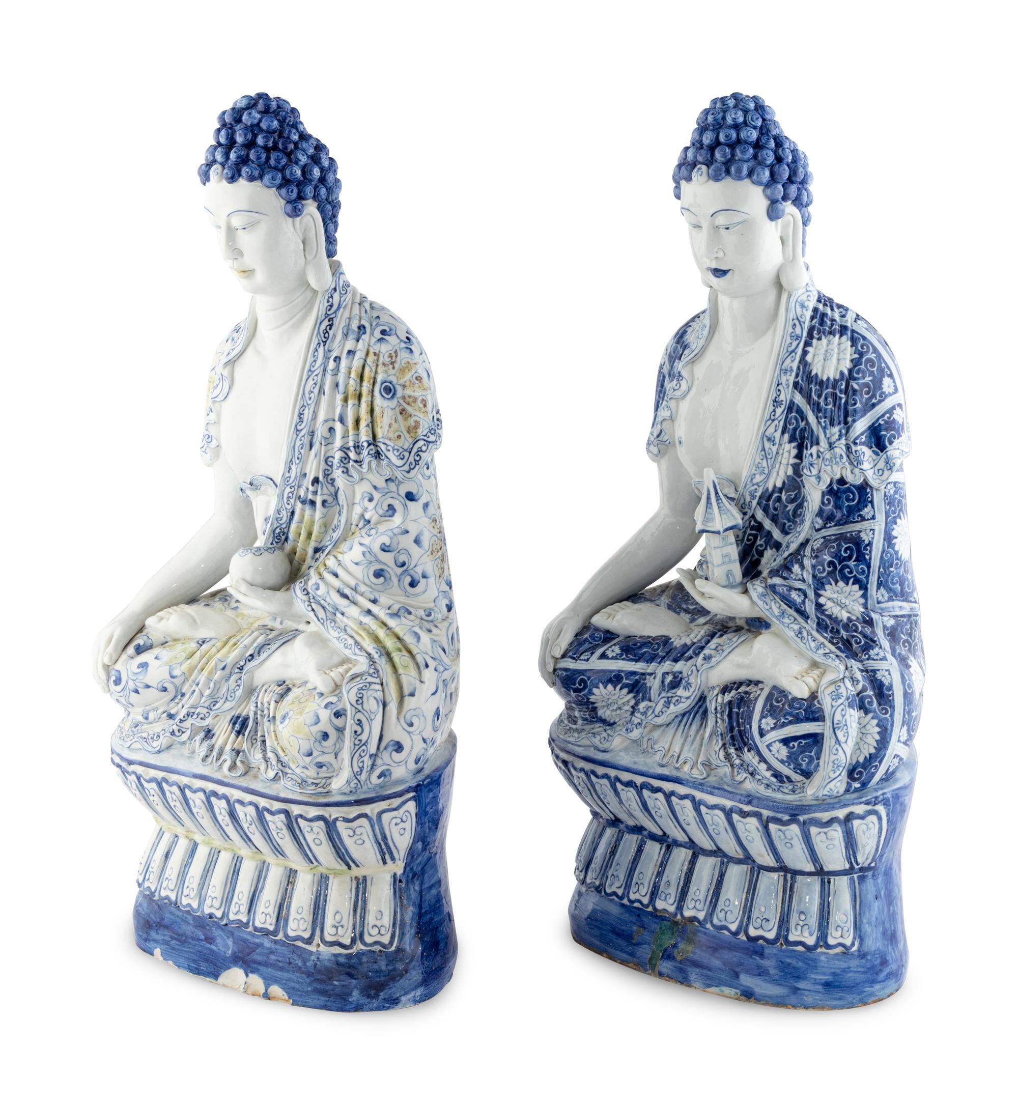 Two Blue and White Glazed Seated Figures