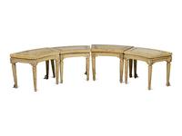 A Set of Four Louis XVI Cream and Polychrome Decorated Curved Window Benches