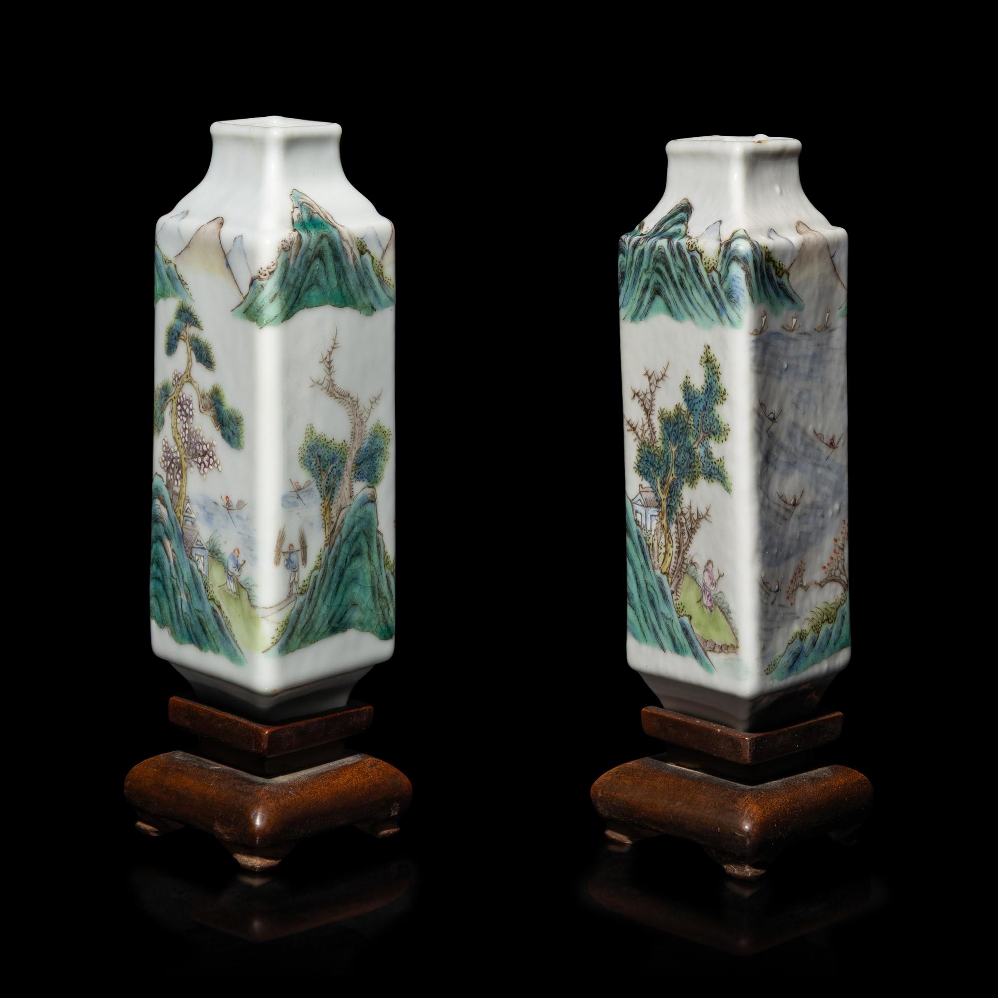 A Pair of Chinese Famille Rose Porcelain Lozenge-Form Vases, Late 19th-Early 20th Century — 晚清-民國 粉彩山水圖方瓶一對 帶木座