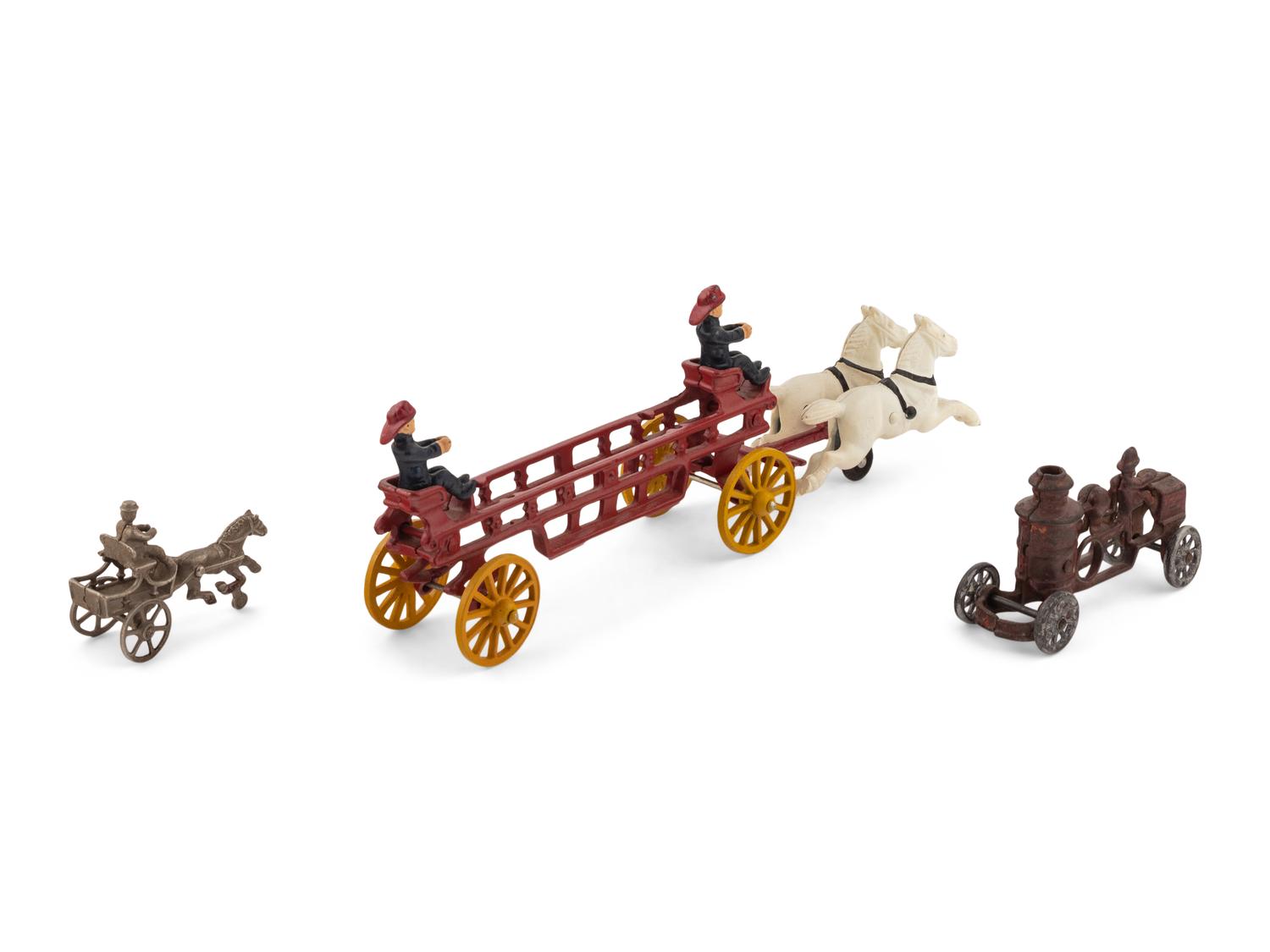 A Group of Three Horse Drawn Cast Iron Toys