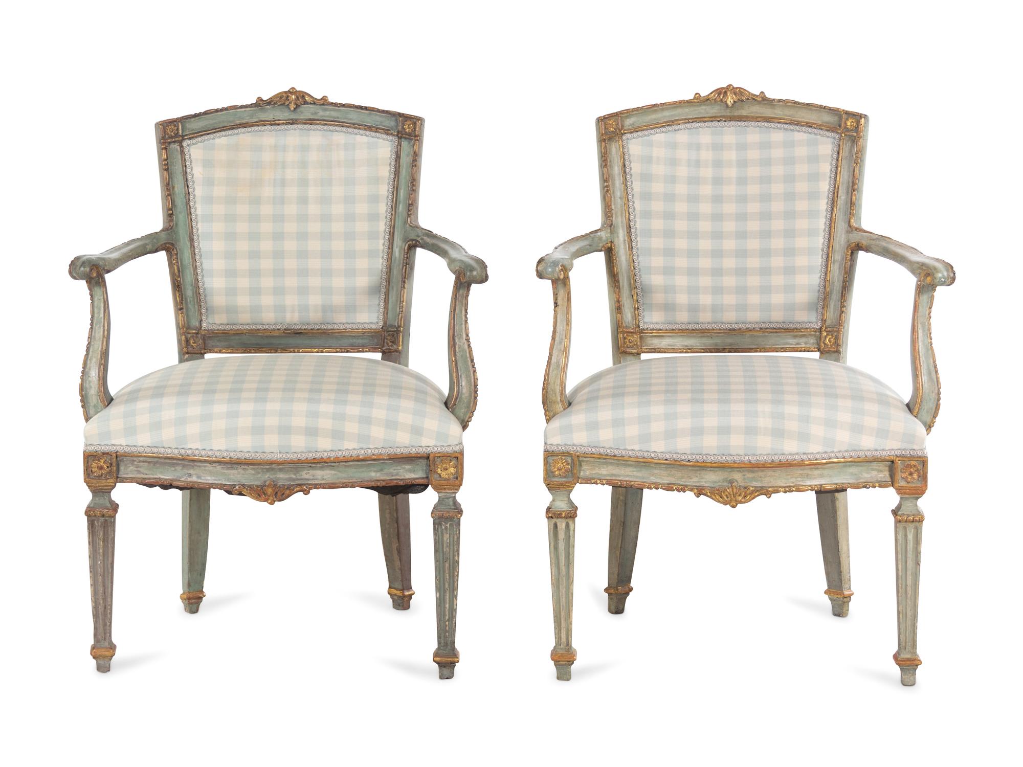 A Pair of Venetian Painted and Parcel Gilt Armchairs