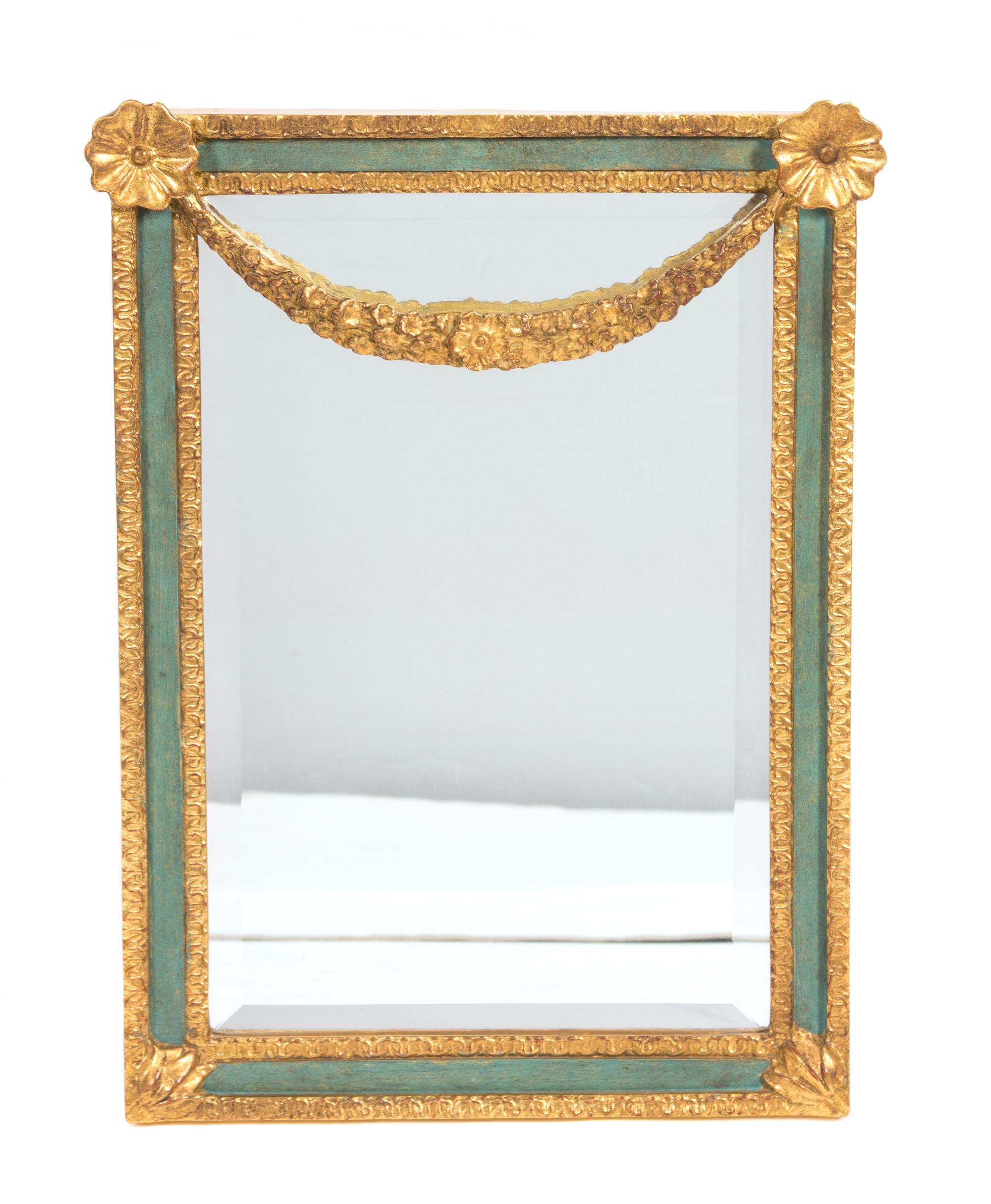 A Carver's Guild "Petite Festoon" Mirror Height 21 x width 16 inches. — 20TH CENTURY