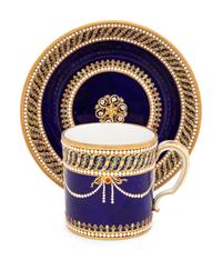 A Sèvres Partially Beau Bleu Jewelled Porcelain Coffee Can and Saucer ( Gobelet 'Litron' et sa Soucoupe, 1ère Grandeur )