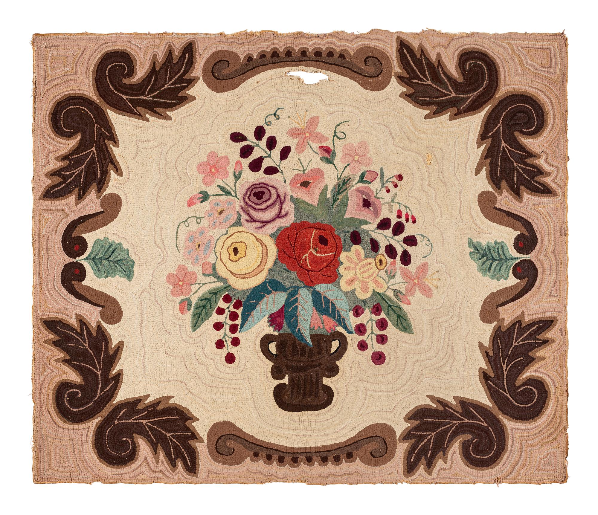 A Cotton Floral Urn and Brown Acanthus Leaf Decorated Hooked Rug